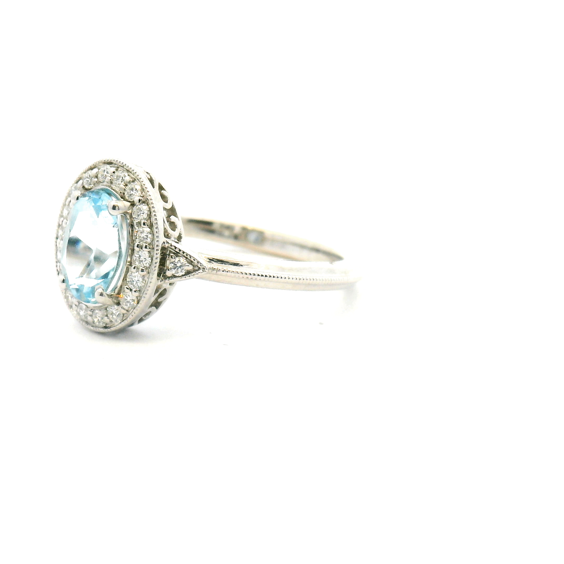 Blue Topaz and Diamond Halo Ring