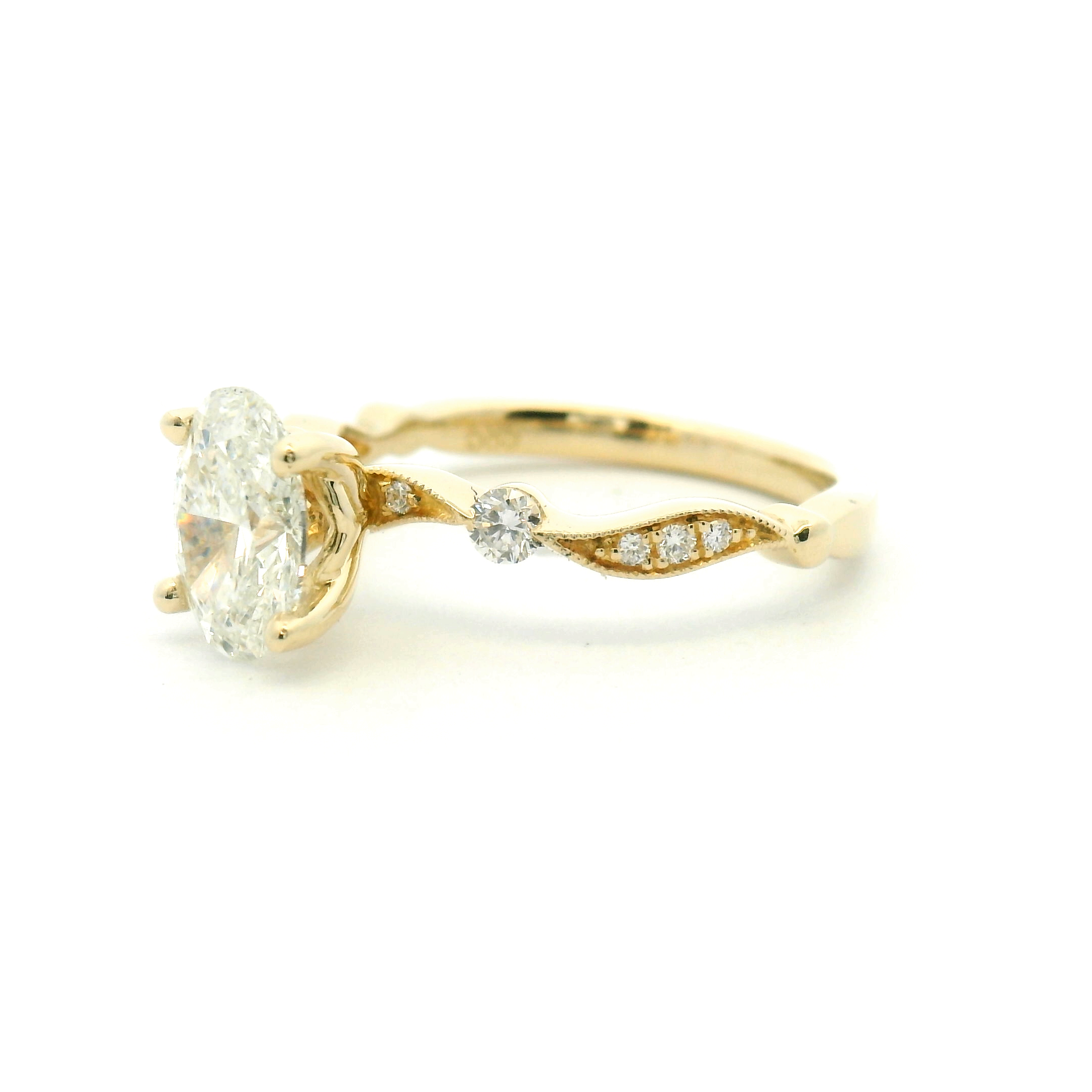 Oval Diamond Engagement Ring with Accented Twist Band