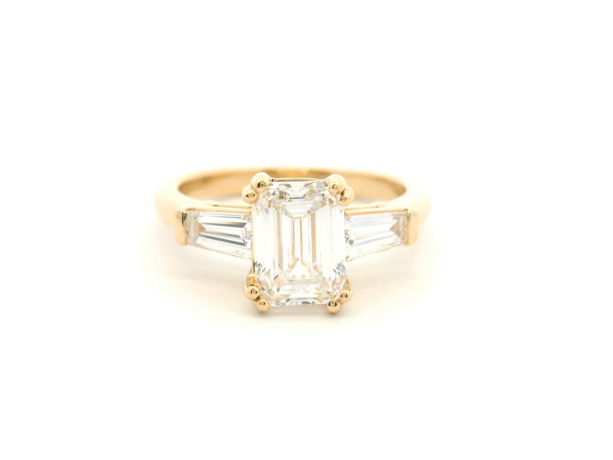 Emerald Cut Diamond Three Stone Engagement Ring