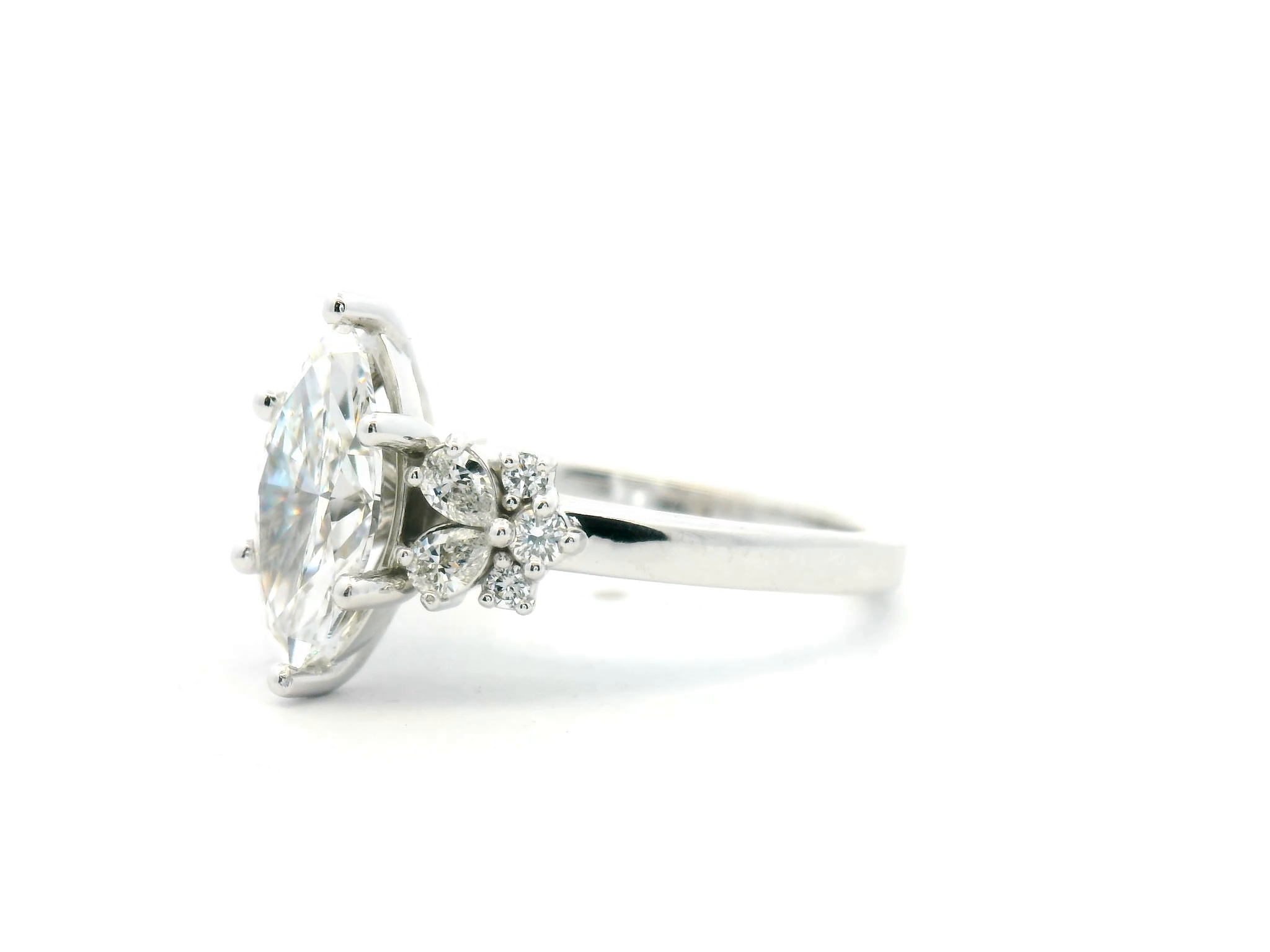 Marquise Diamond Engagement Ring with Pear & Round Cluster Accents