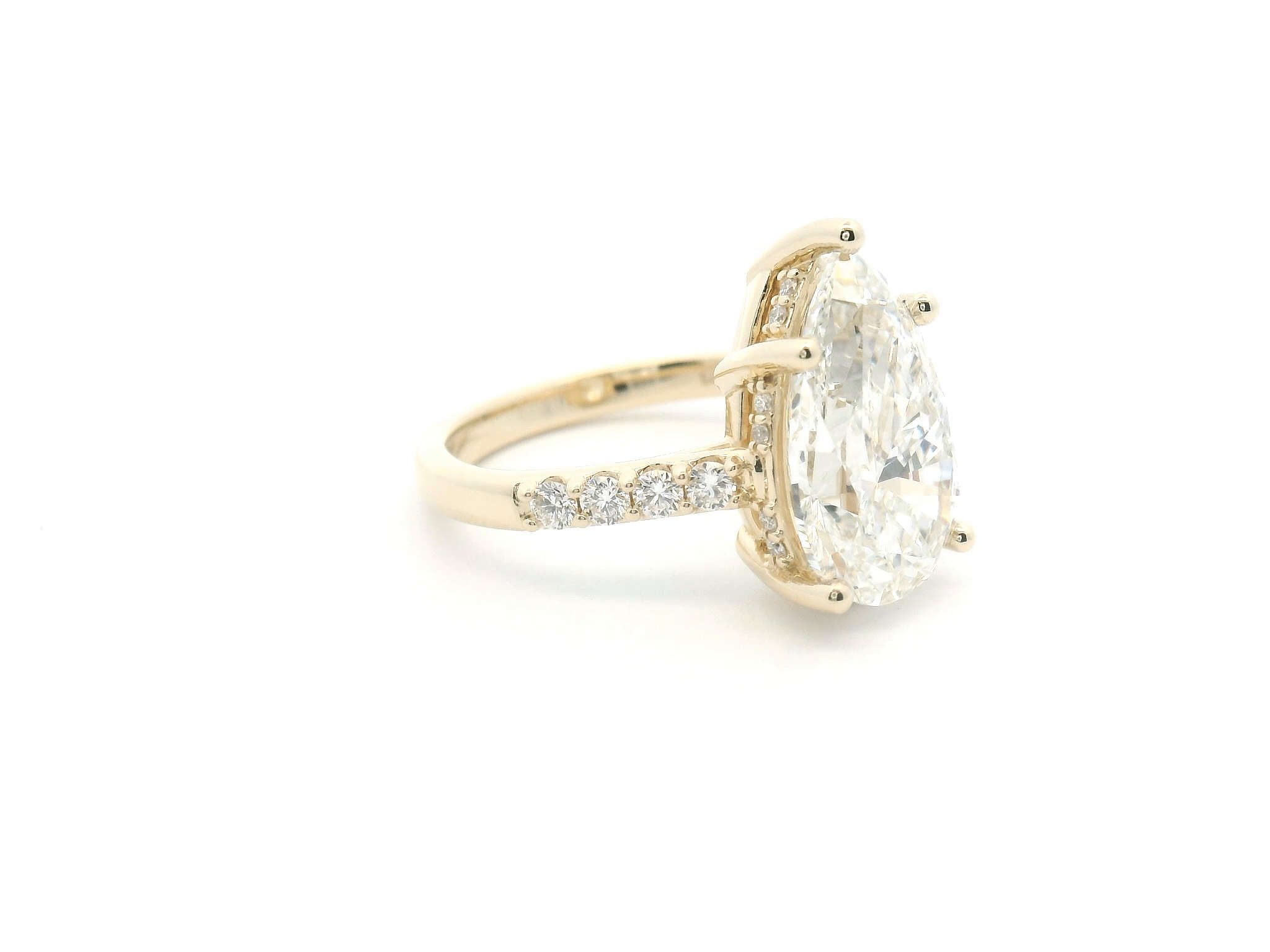 Pear Diamond Hidden Halo Engagement Ring with Accented Shank