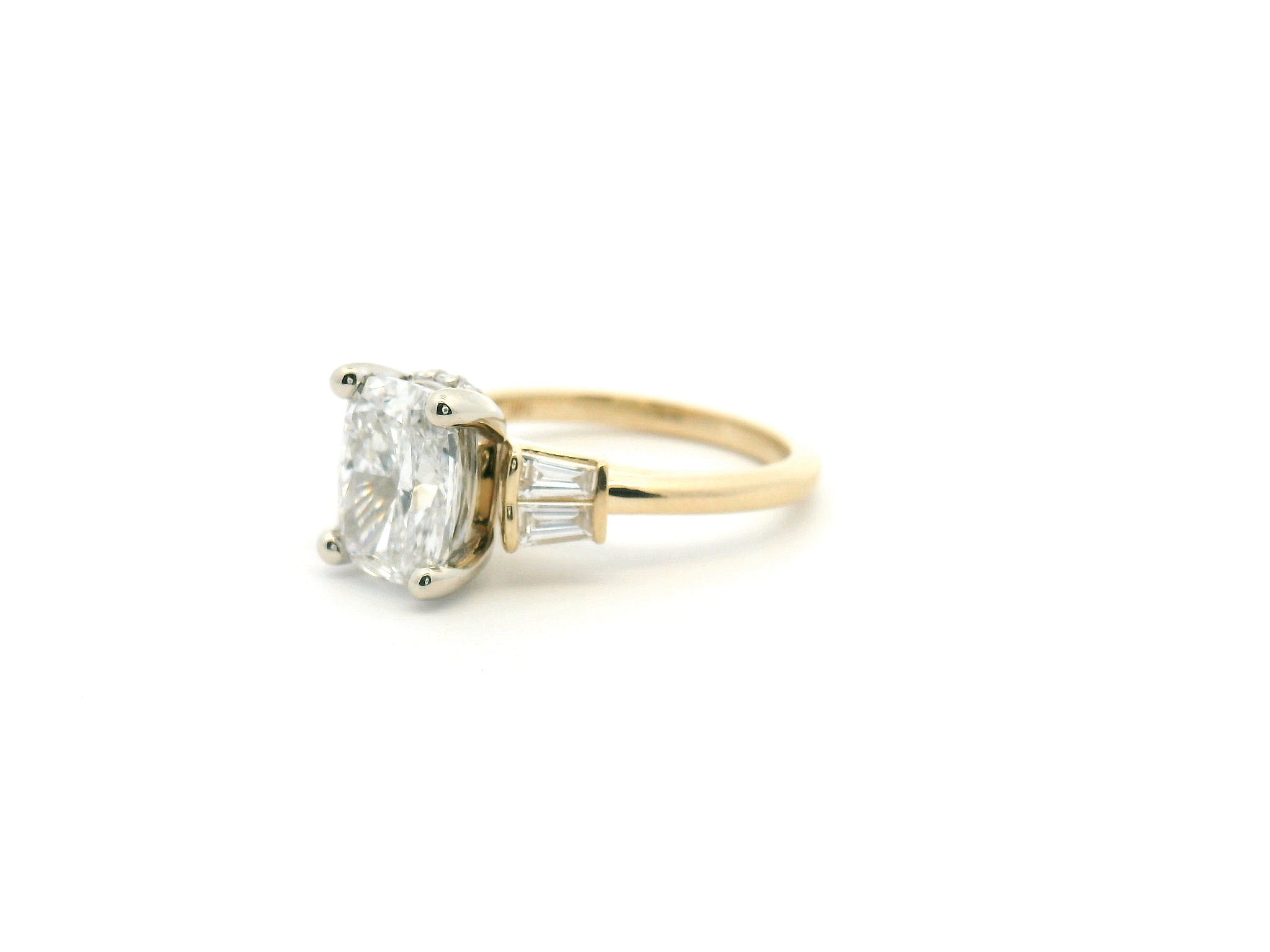 Elongated Cushion Diamond Engagement Ring with Tapered Baguette Side Stones