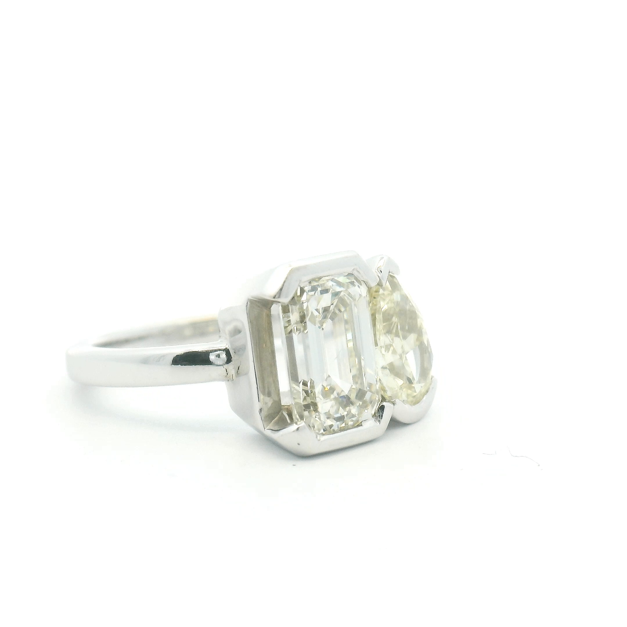 Emerald Cut & Yellow Pear Diamond Half Bezel Two-Stone Engagement Ring