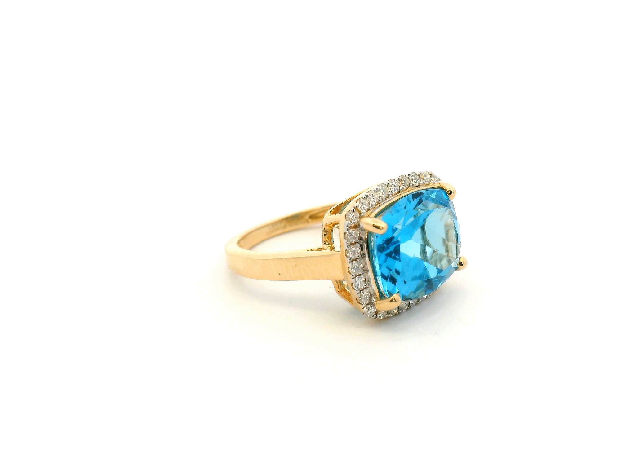 Blue Topaz and Diamond Halo Ring