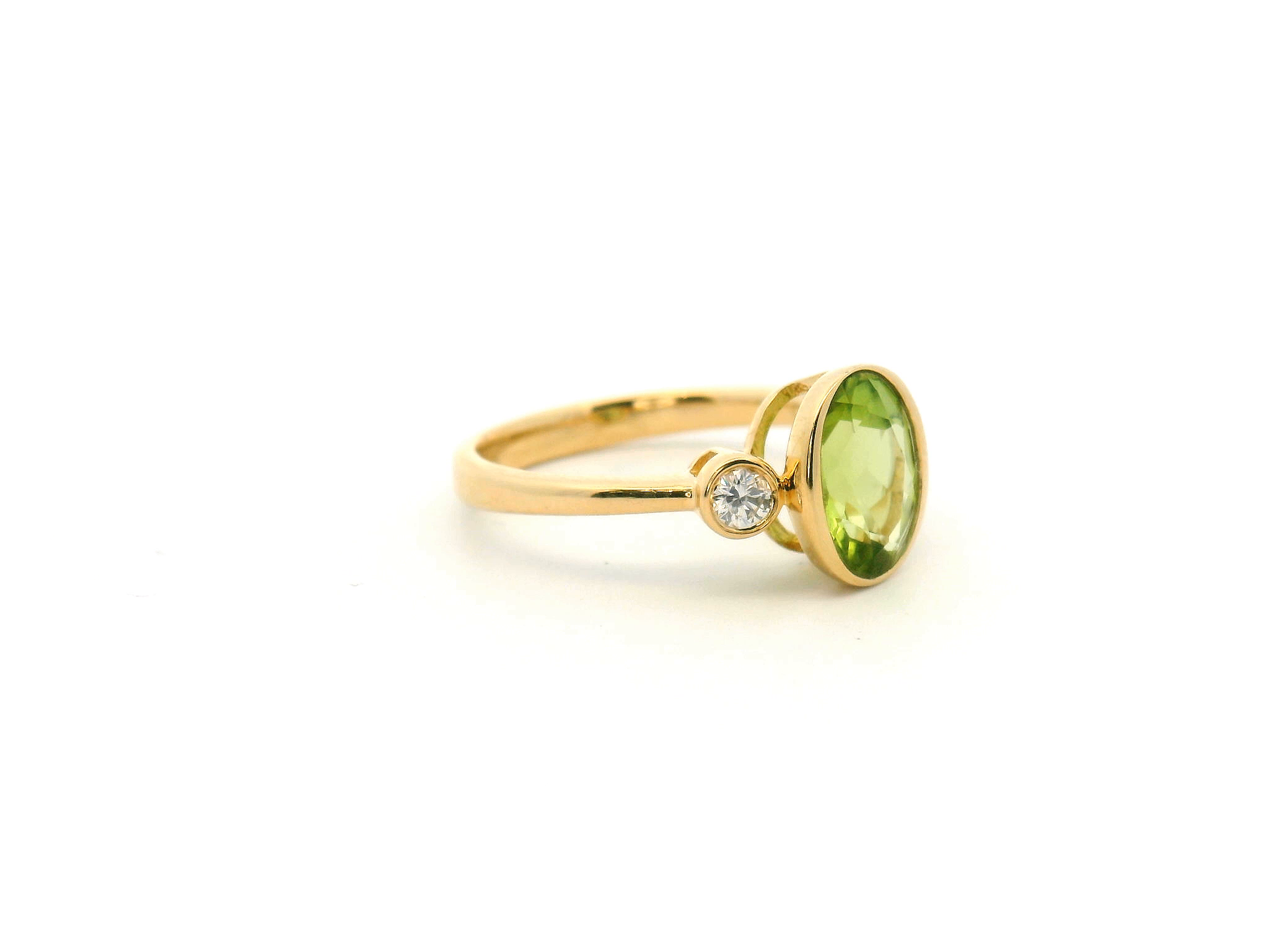 Peridot Bezel Set Three Stone Ring