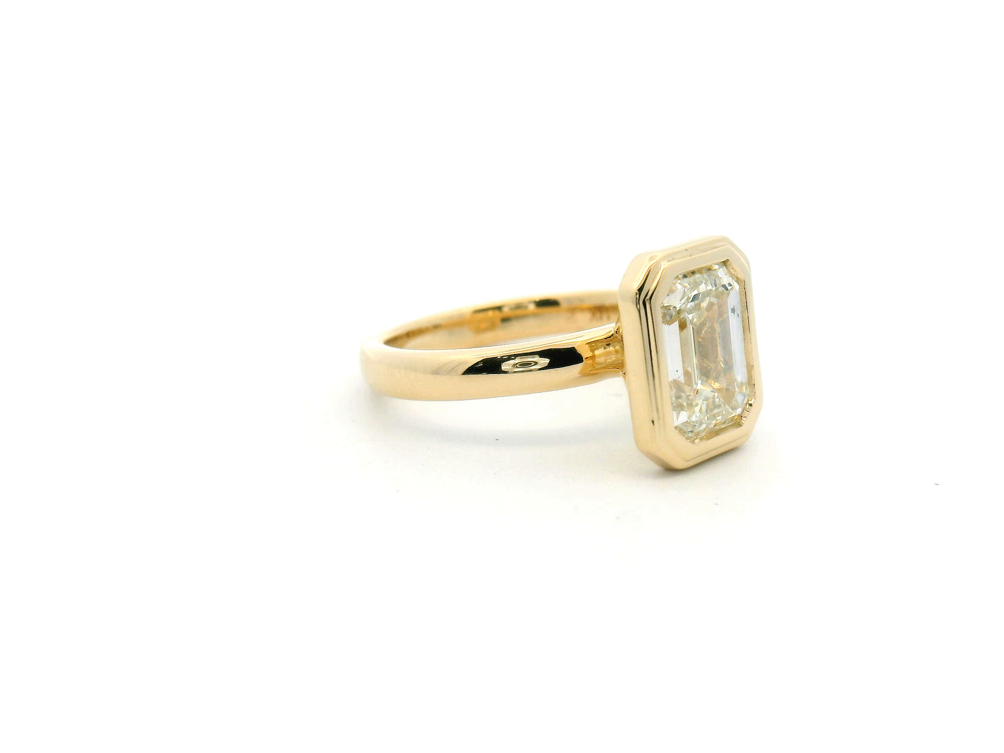 Emerald Cut Diamond Bezel Set Engagement Ring