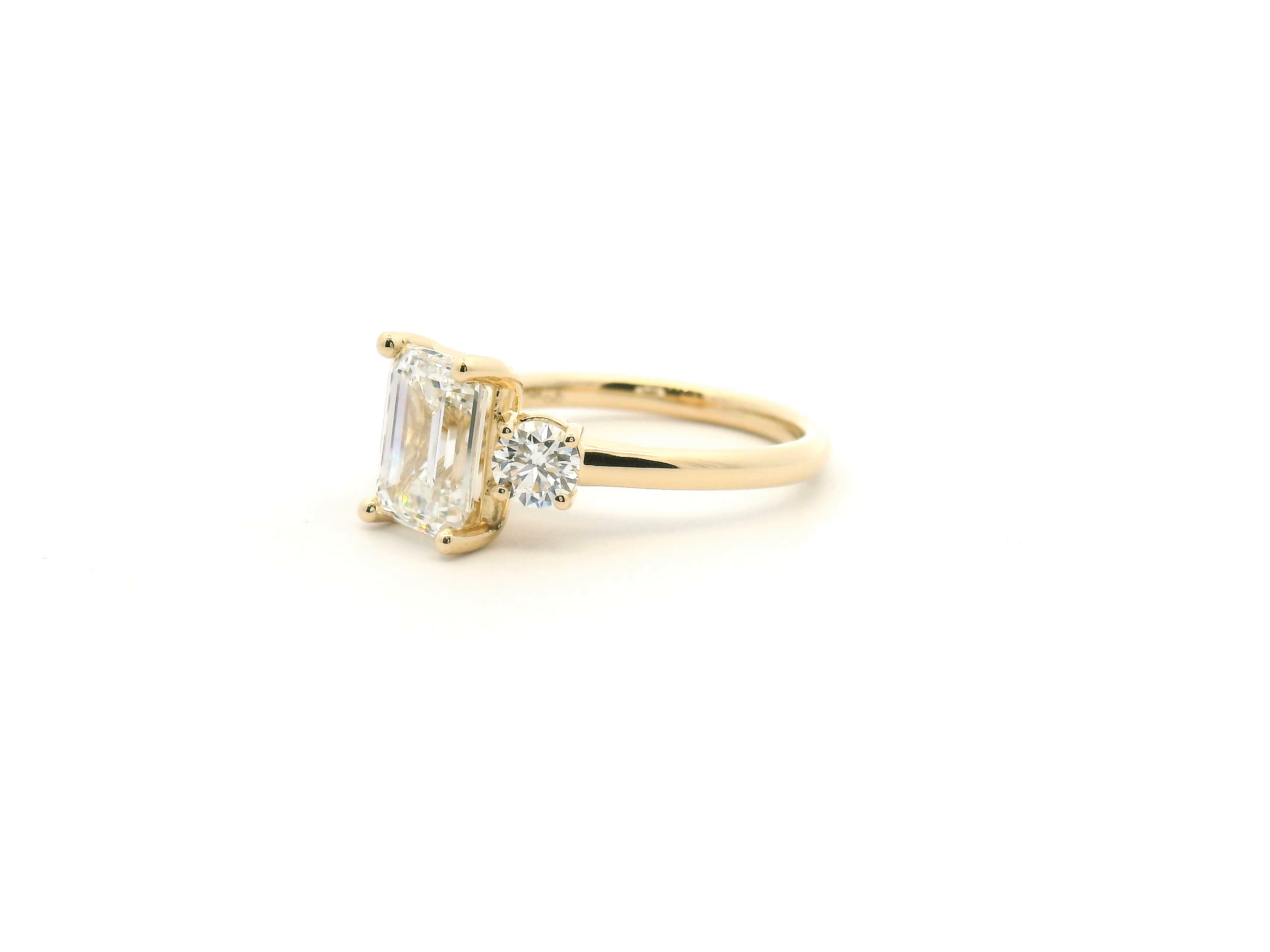 Emerald Cut Three Stone Diamond Engagement Ring