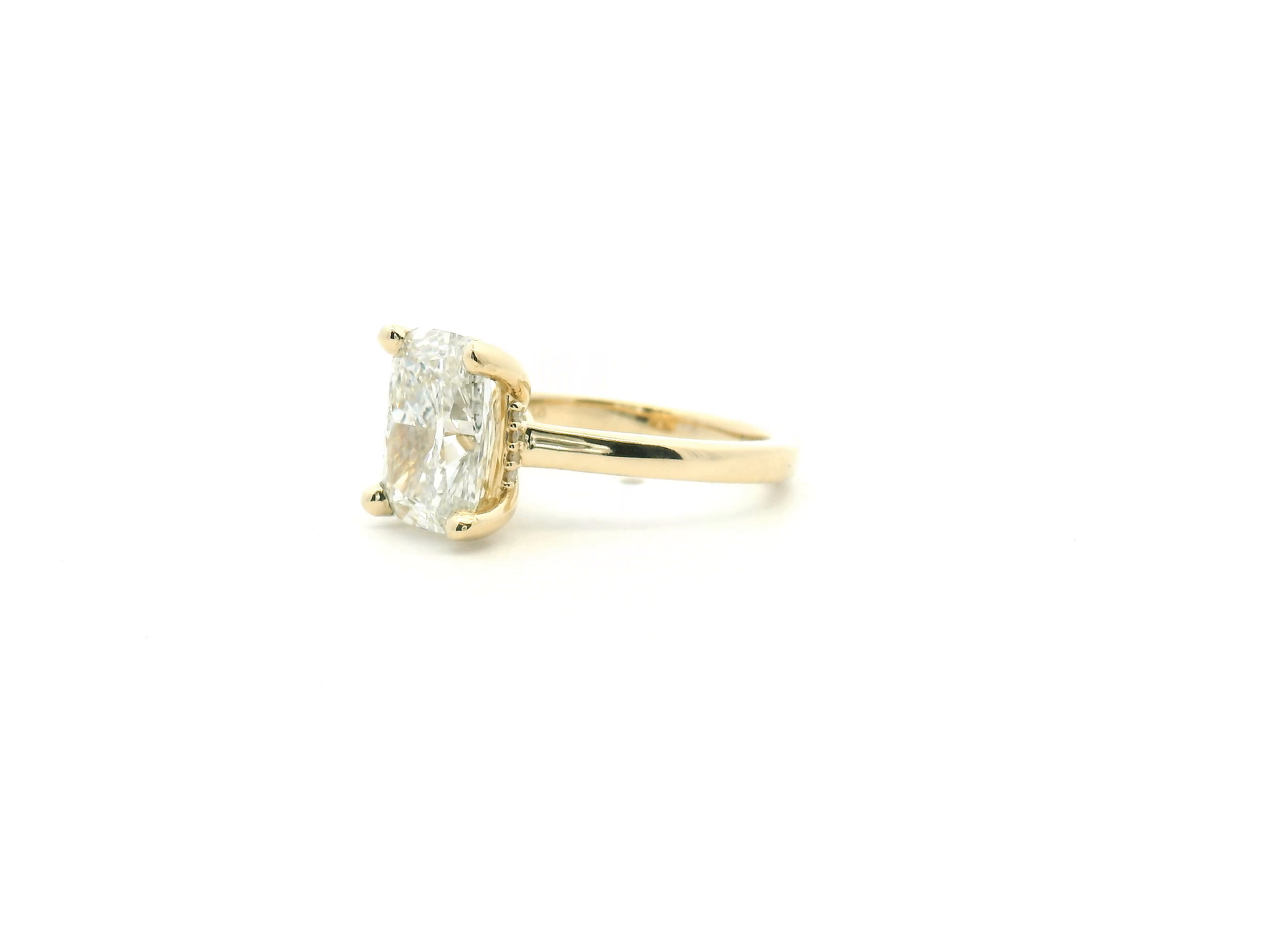 Elongated Cushion Hidden Halo Engagement Ring