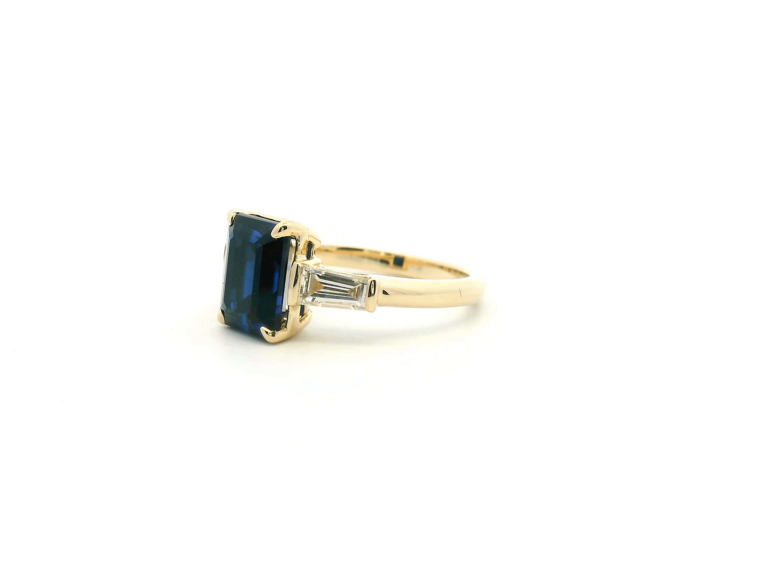 Blue Sapphire Three Stone Engagement Ring