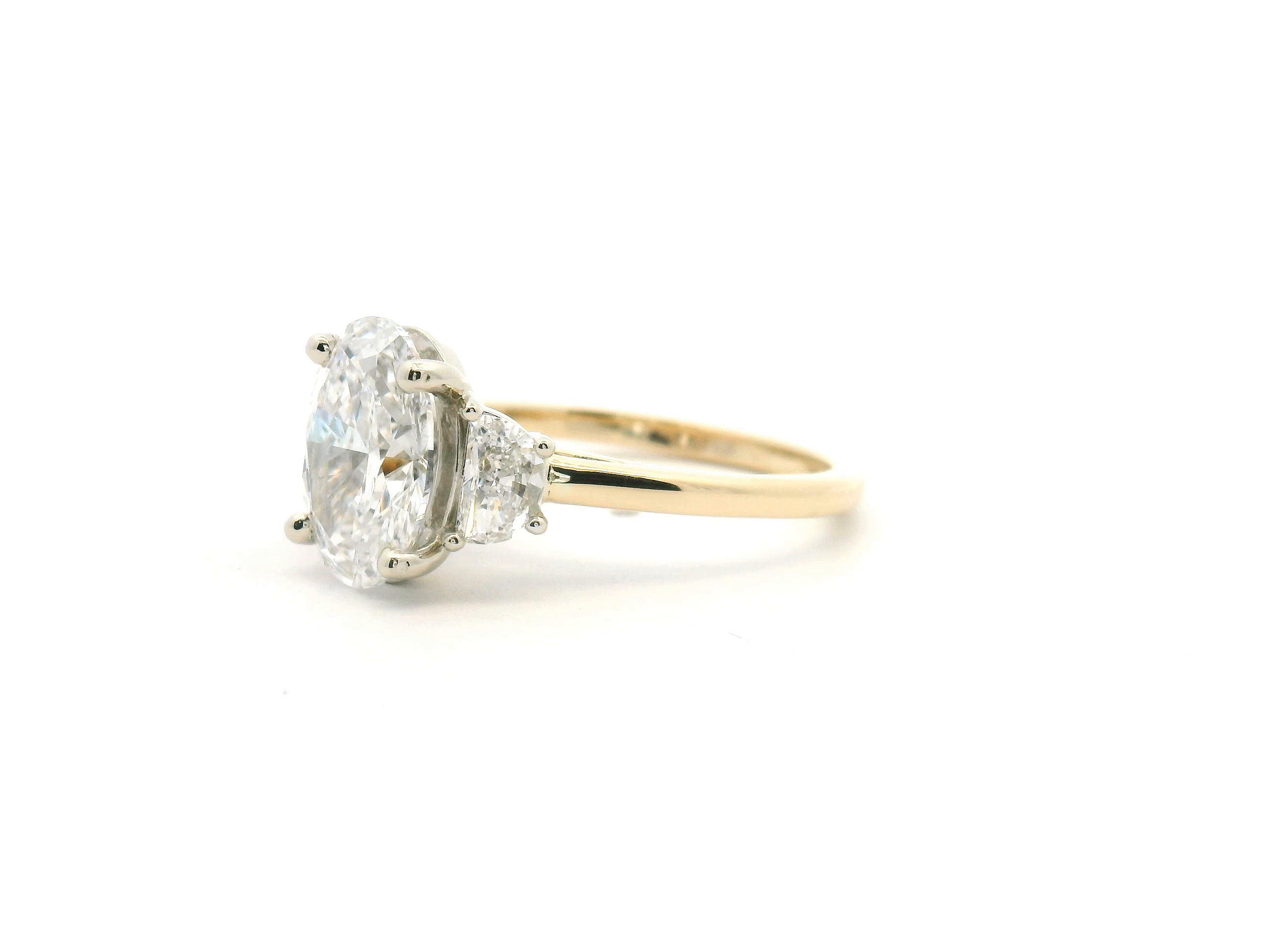 Oval Three Stone Engagement Ring