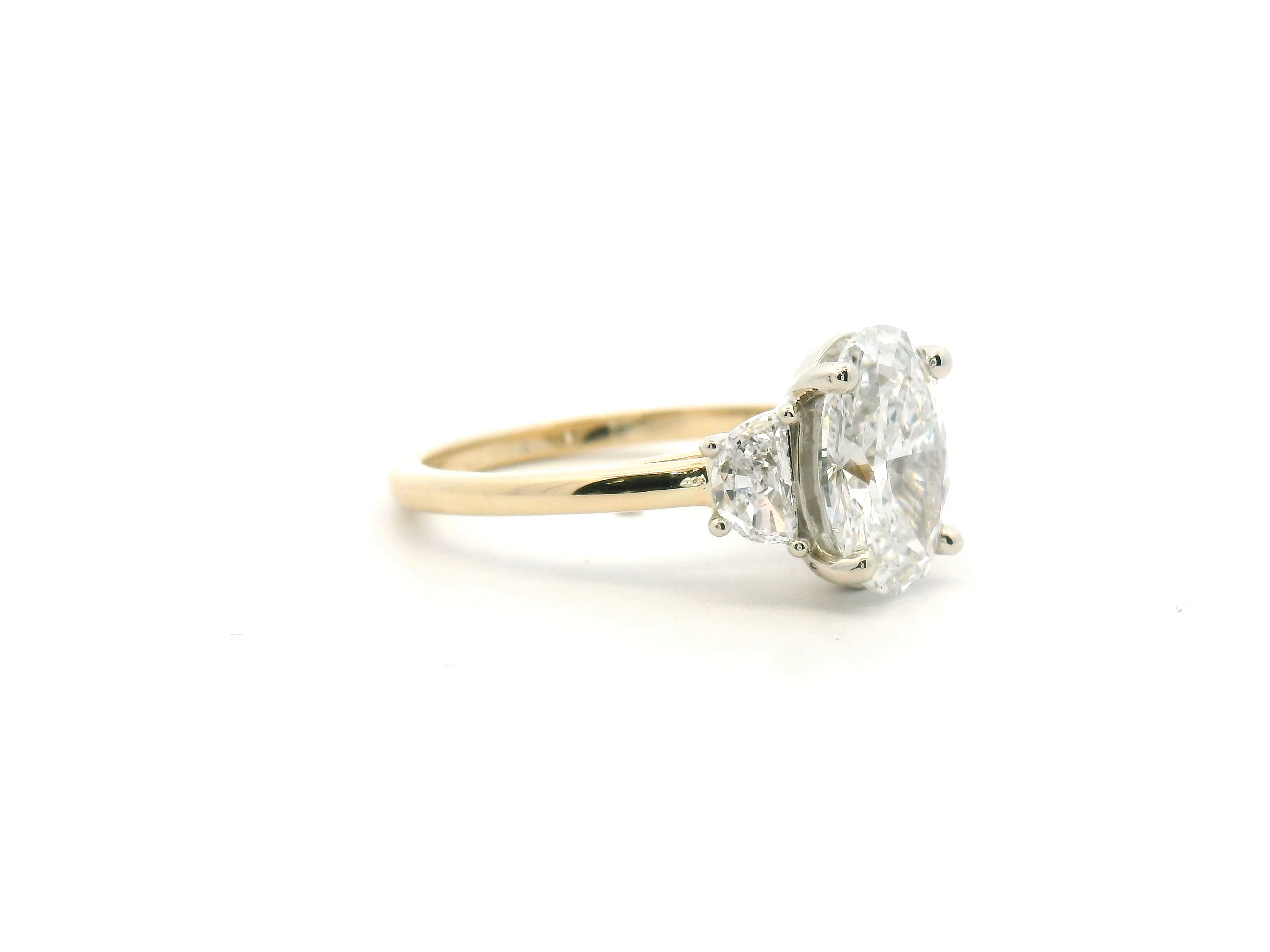 Oval Three Stone Engagement Ring