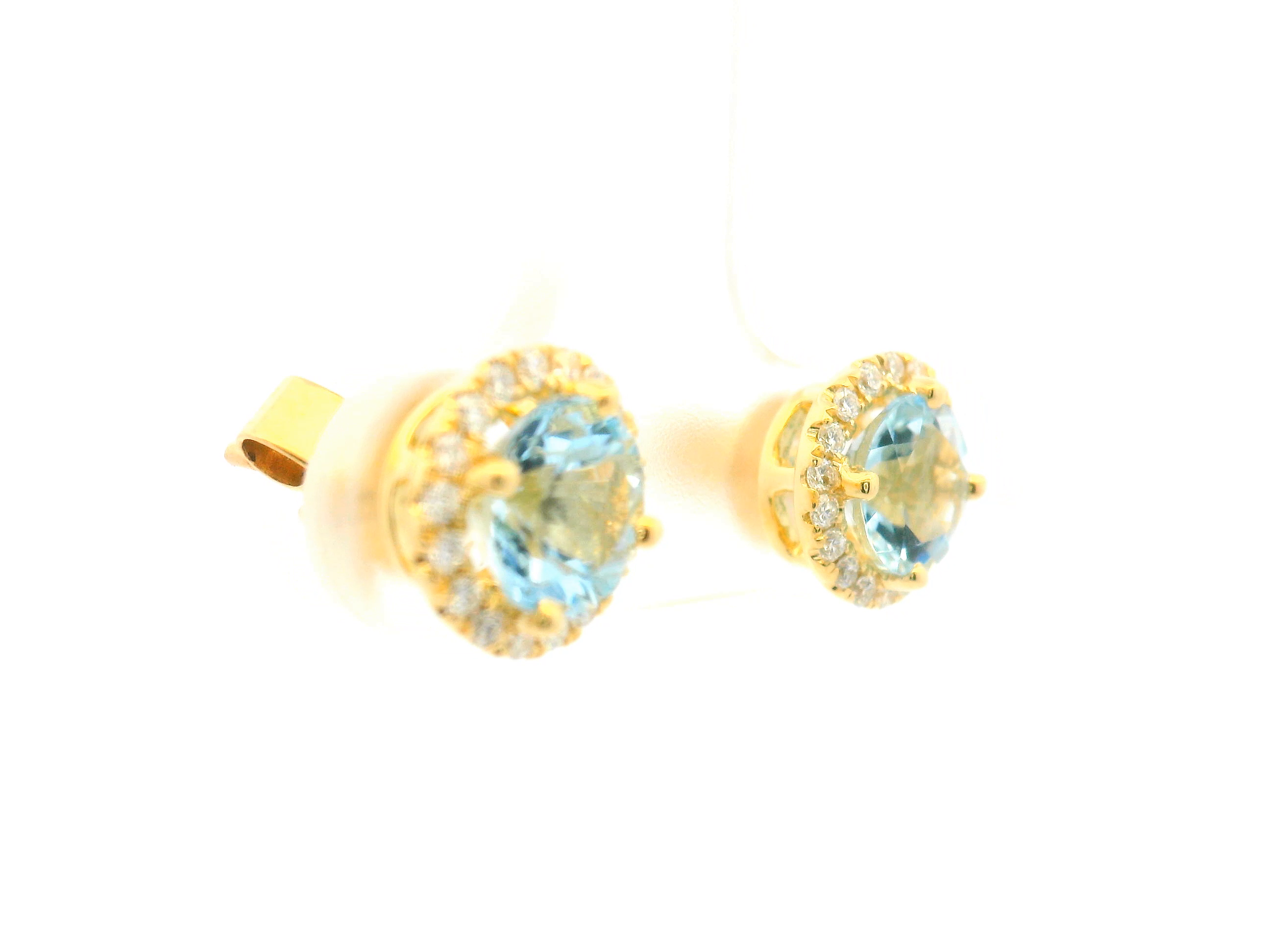 Aquamarine and Diamond Halo Stud Earrings