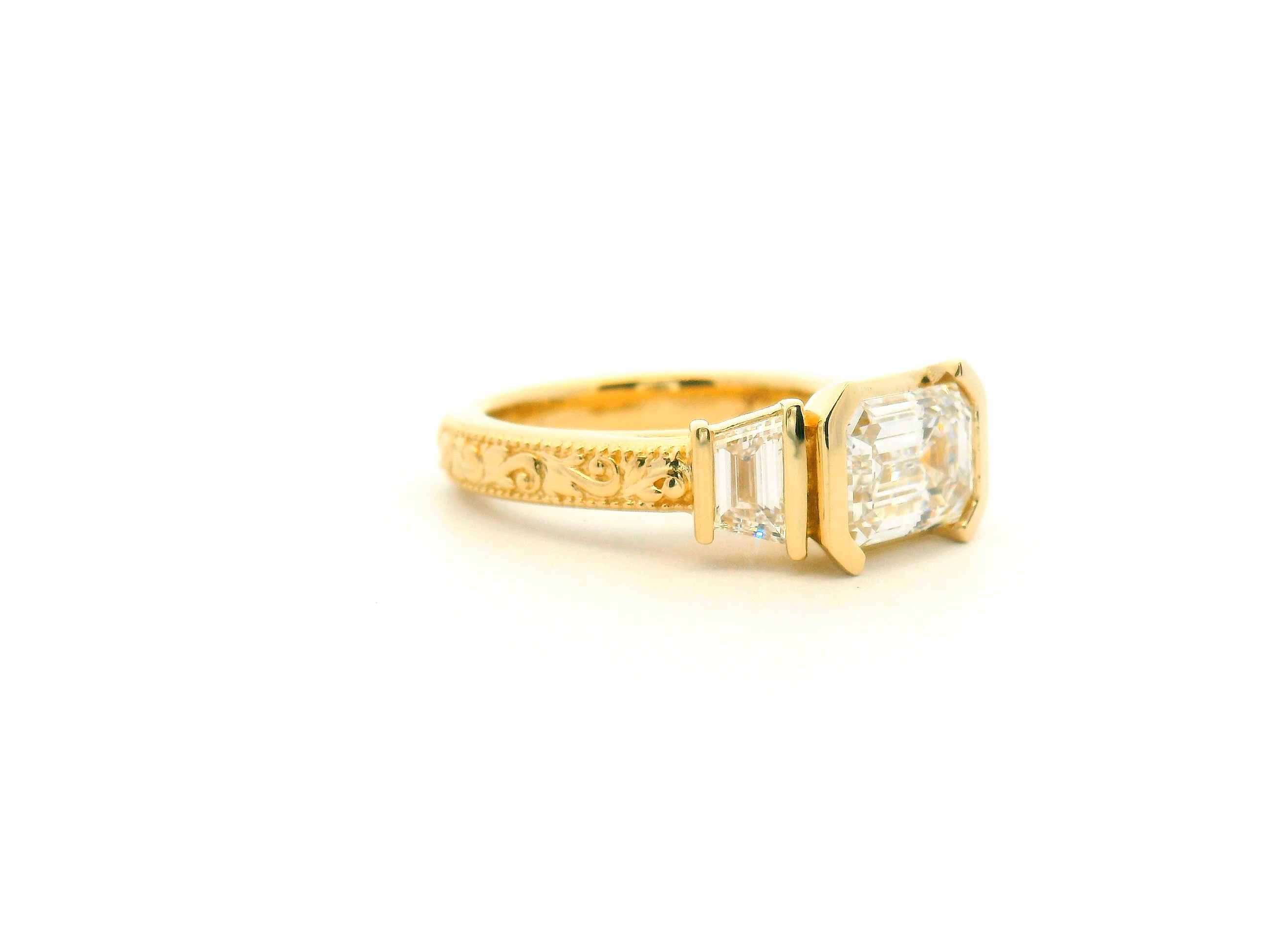 East-West Emerald Cut Three Stone Engagement Ring