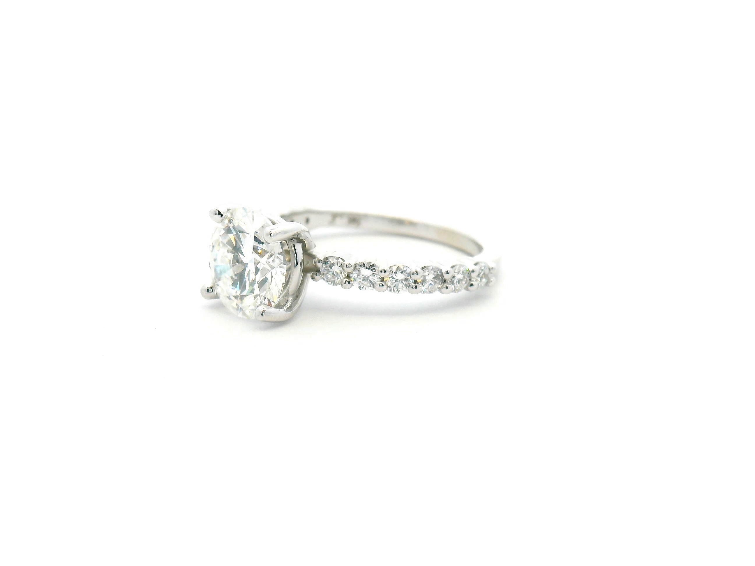 Round Diamond Shared Prong Engagement Ring