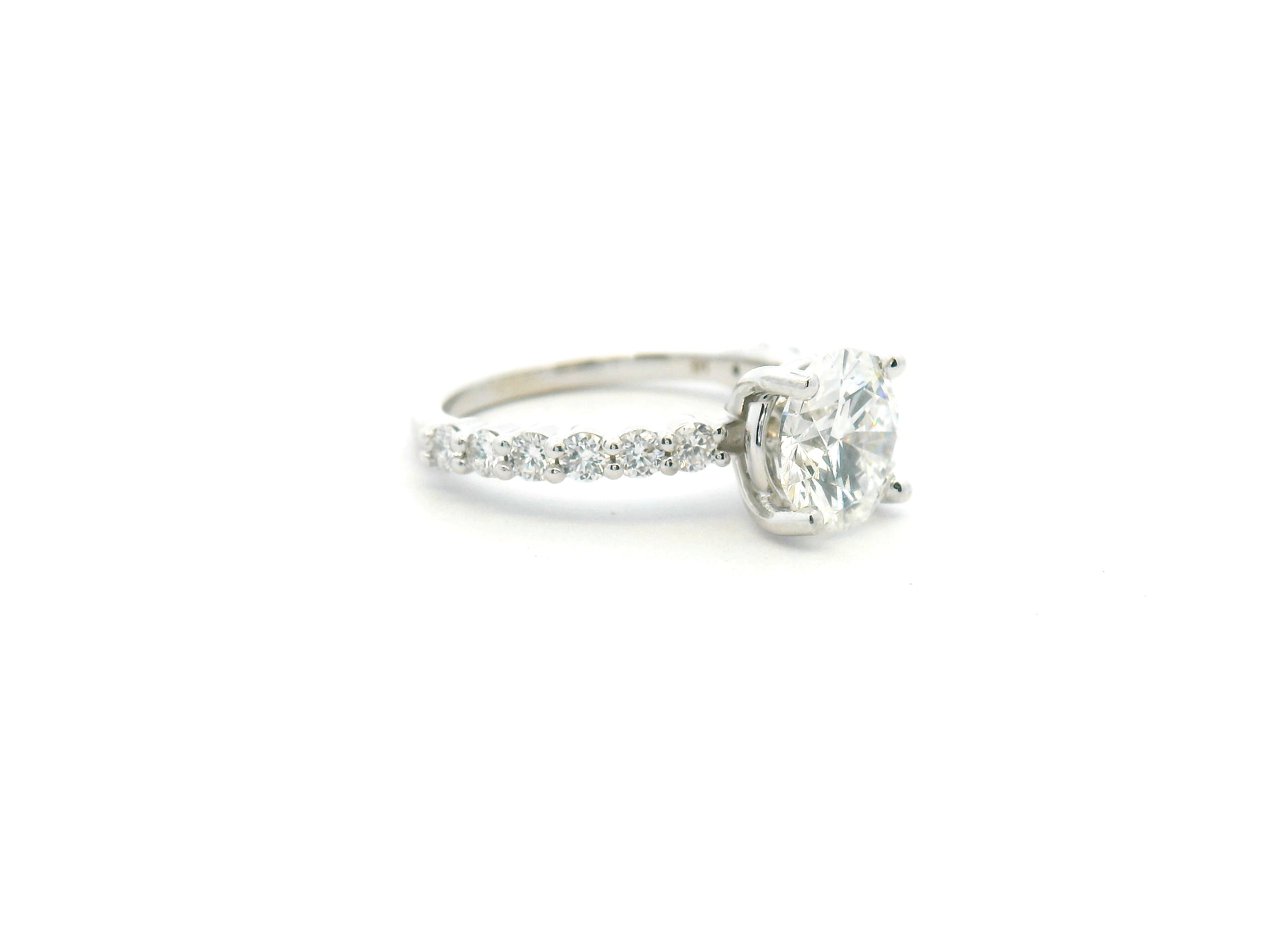 Round Diamond Shared Prong Engagement Ring