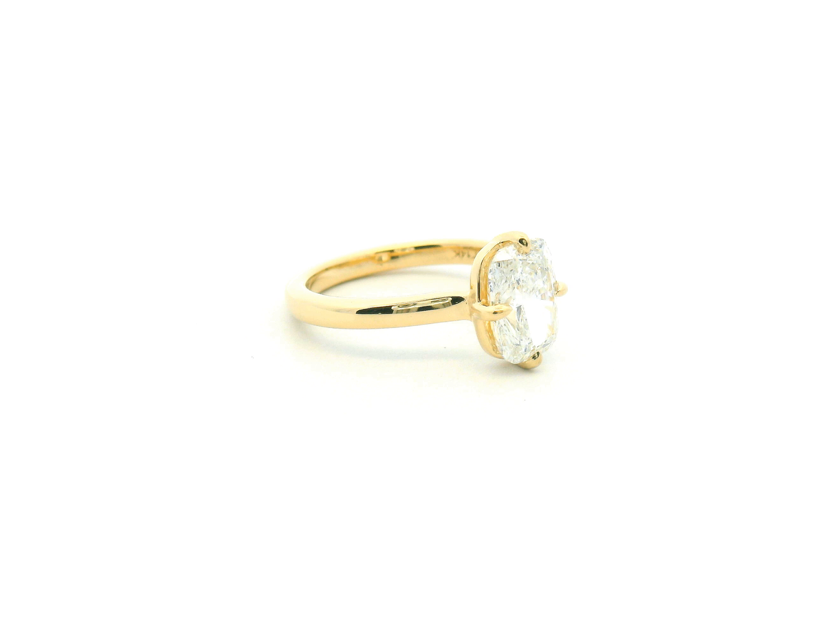 Elongated Cushion Cathedral Solitaire Engagement Ring with Compass Claw Prongs
