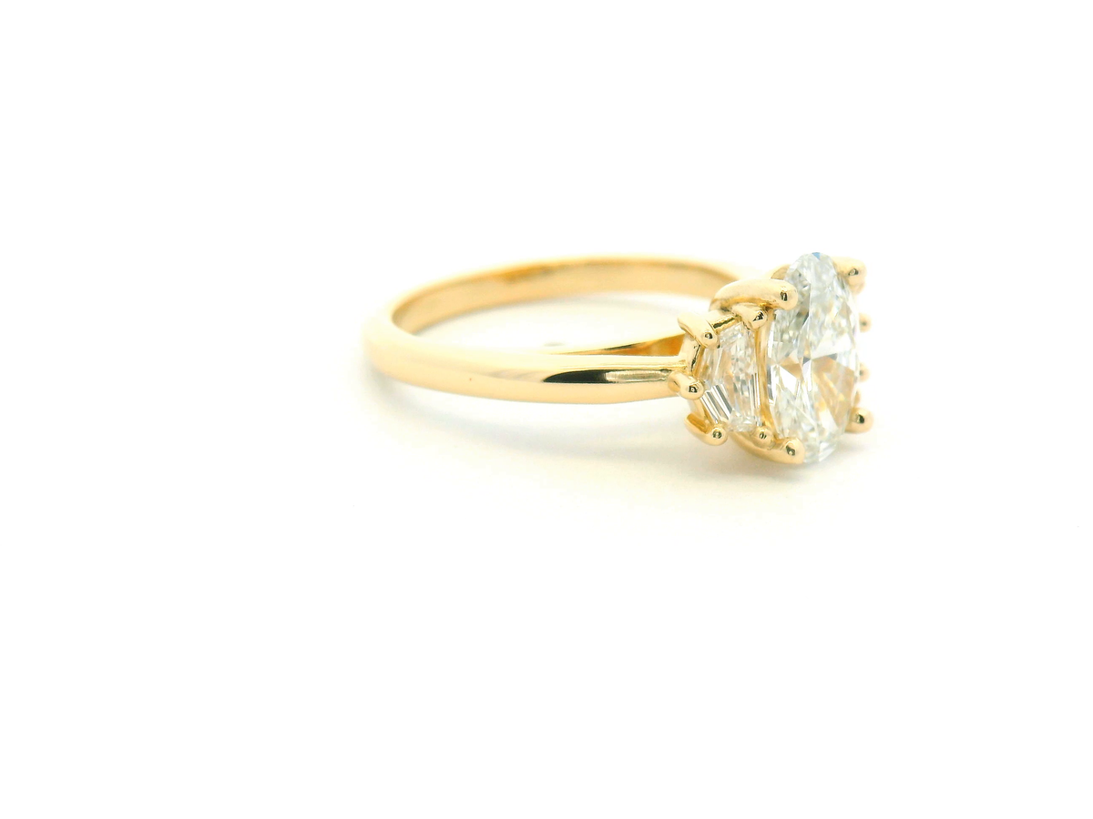 Oval Three-Stone Engagement Ring with Cadillac Side Diamonds