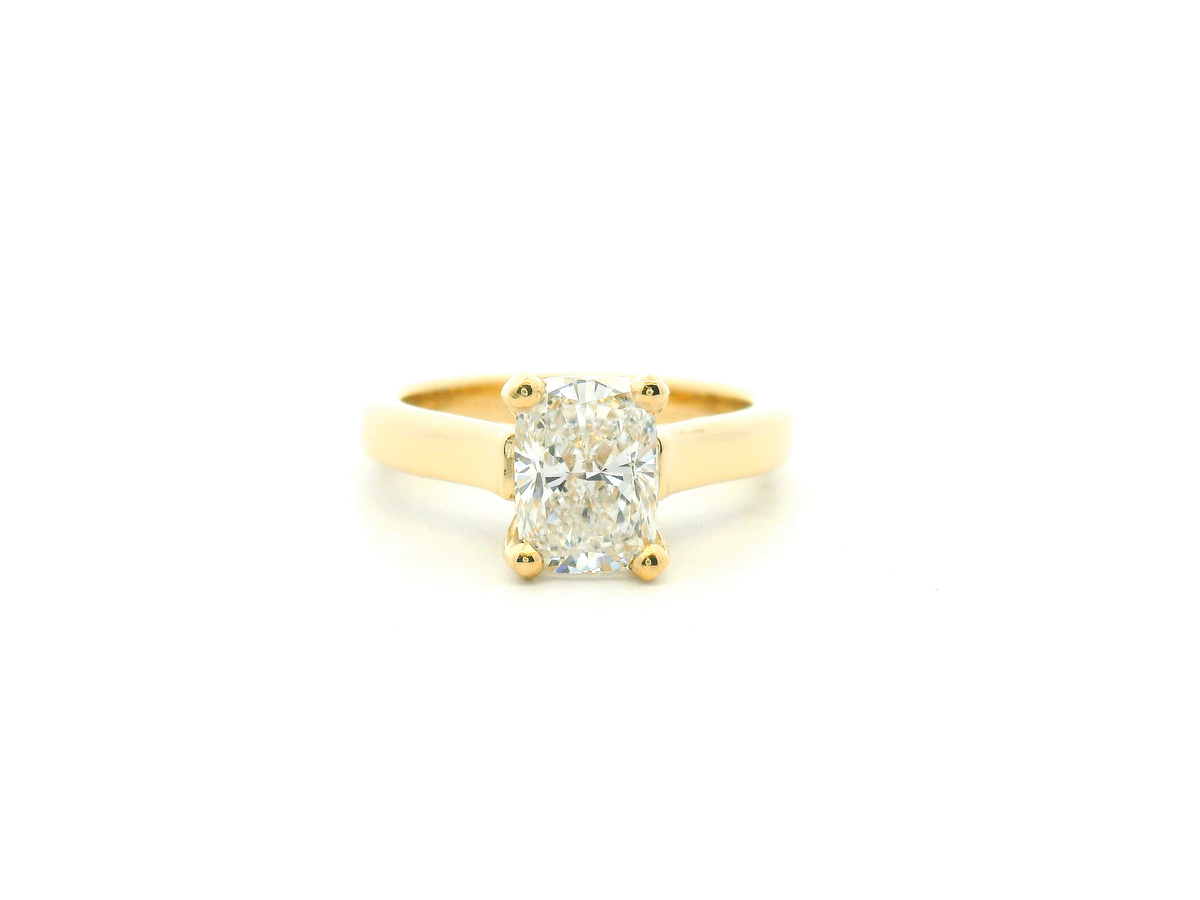 Elongated Cushion Engagement Ring with Bold Cathedral