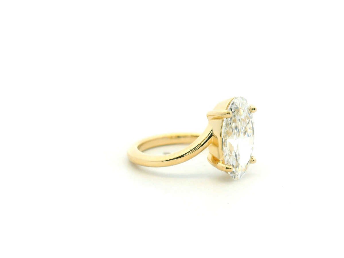 Moval Engagement Ring with Sculptural Open Split Shank