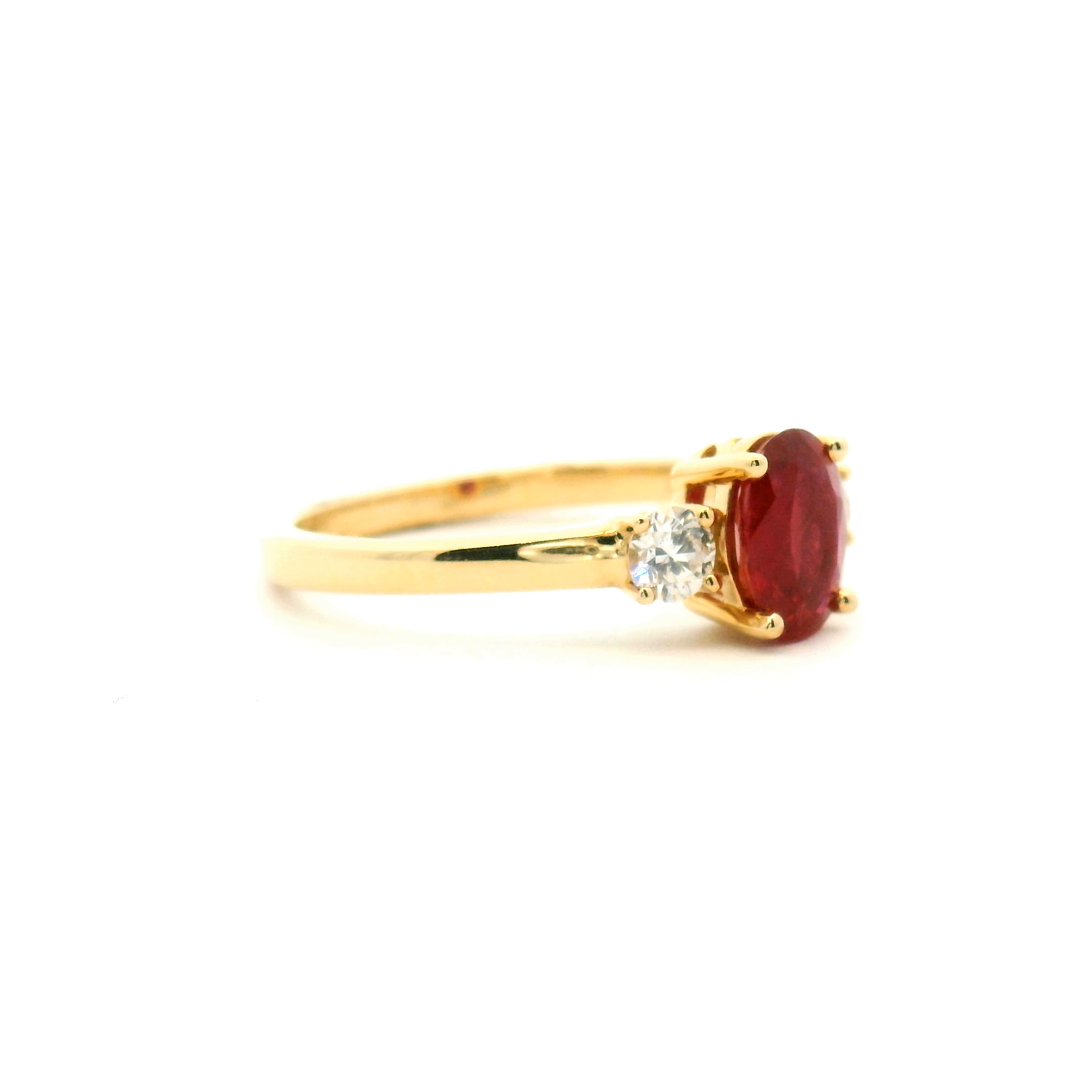 Oval Ruby Three Stone Ring with Diamond Accents