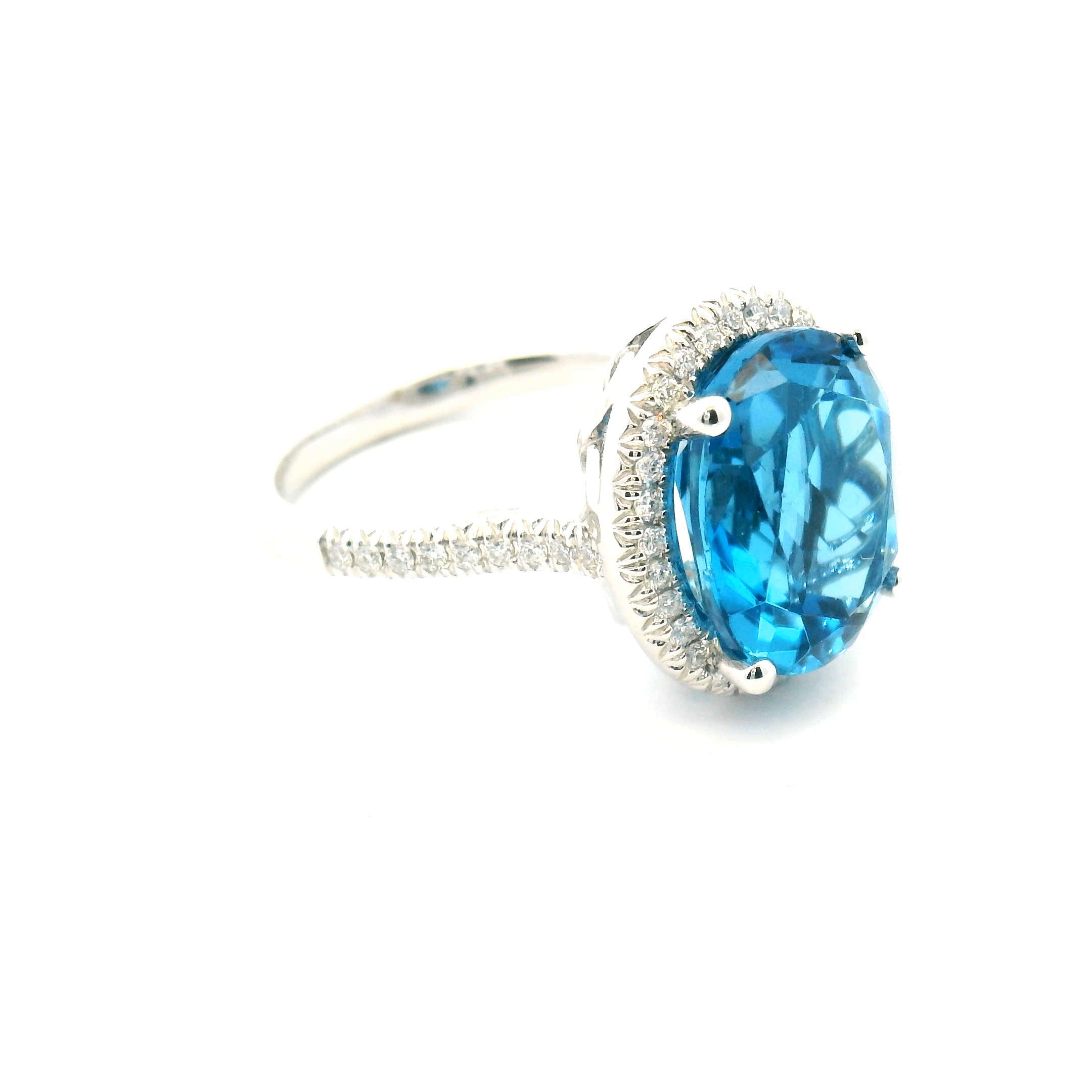 Blue Topaz and Diamond Halo Ring