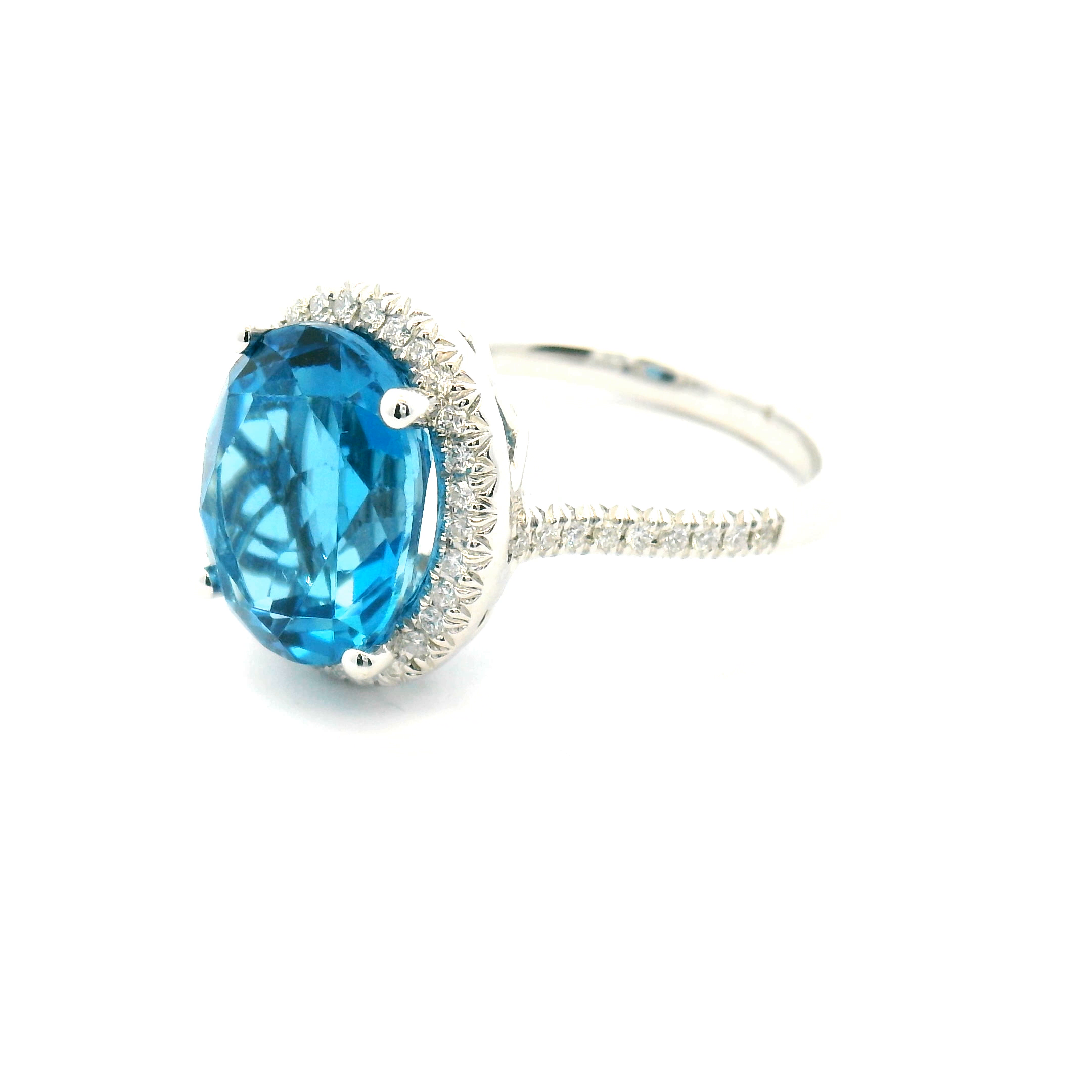 Blue Topaz and Diamond Halo Ring