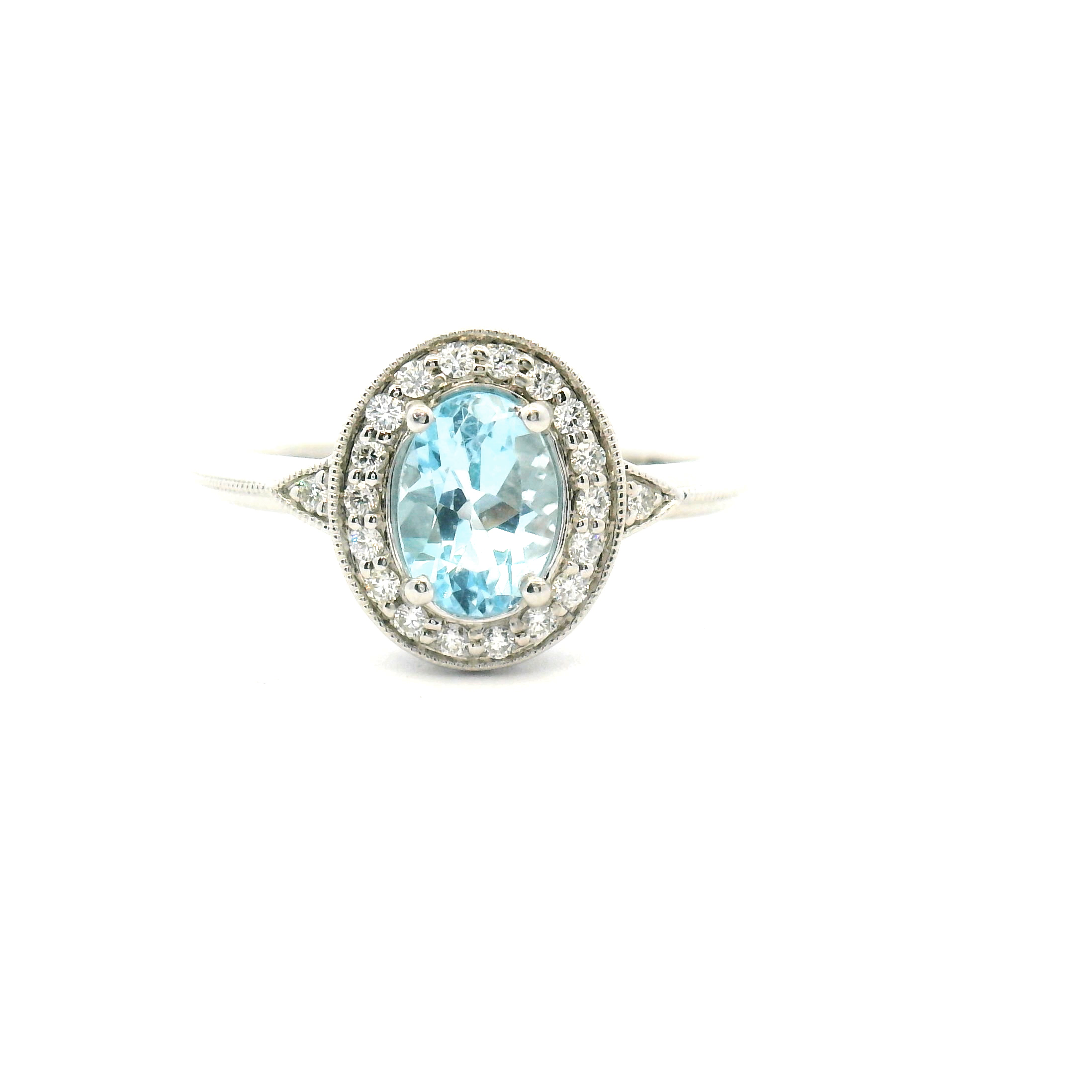 Blue Topaz and Diamond Halo Ring