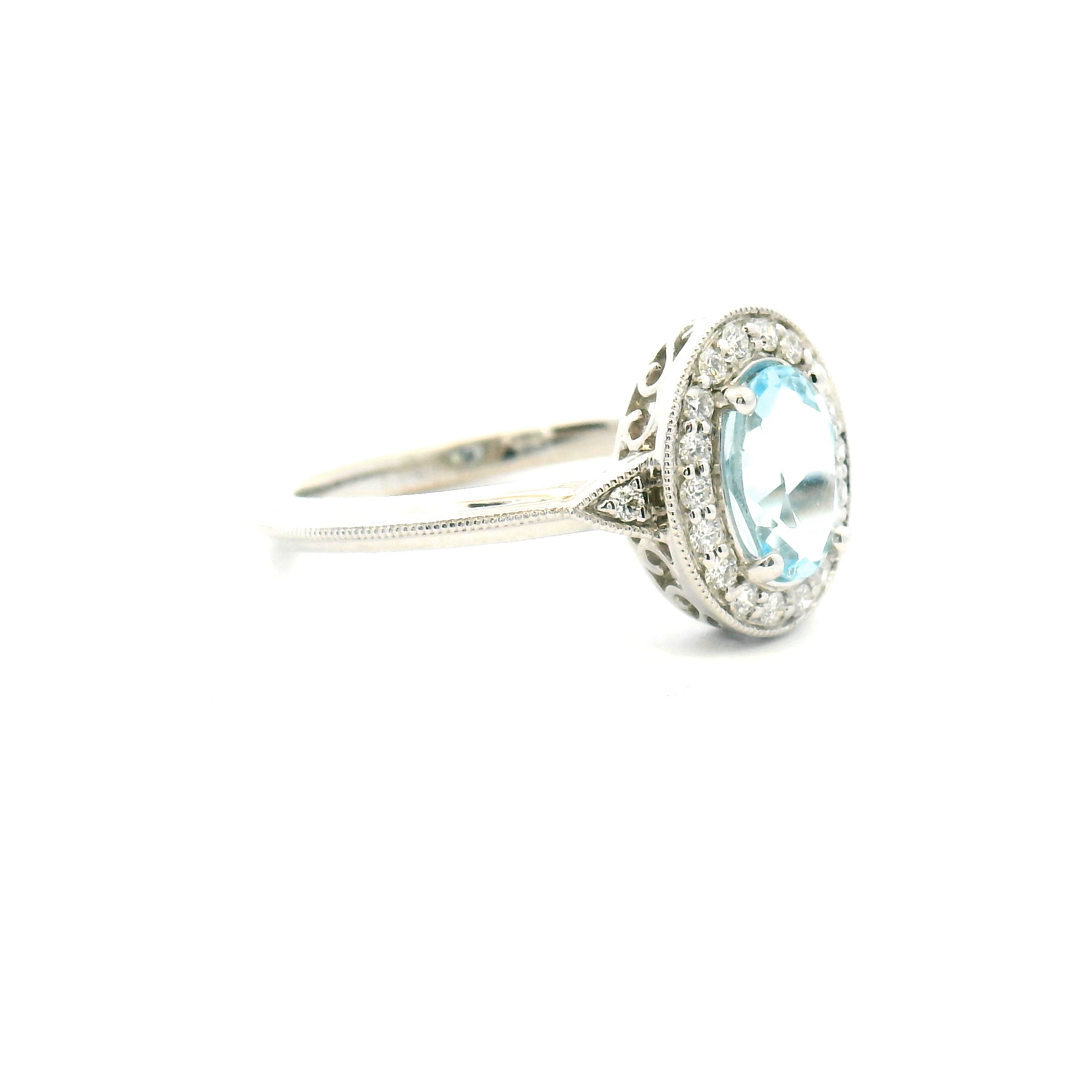Blue Topaz and Diamond Halo Ring