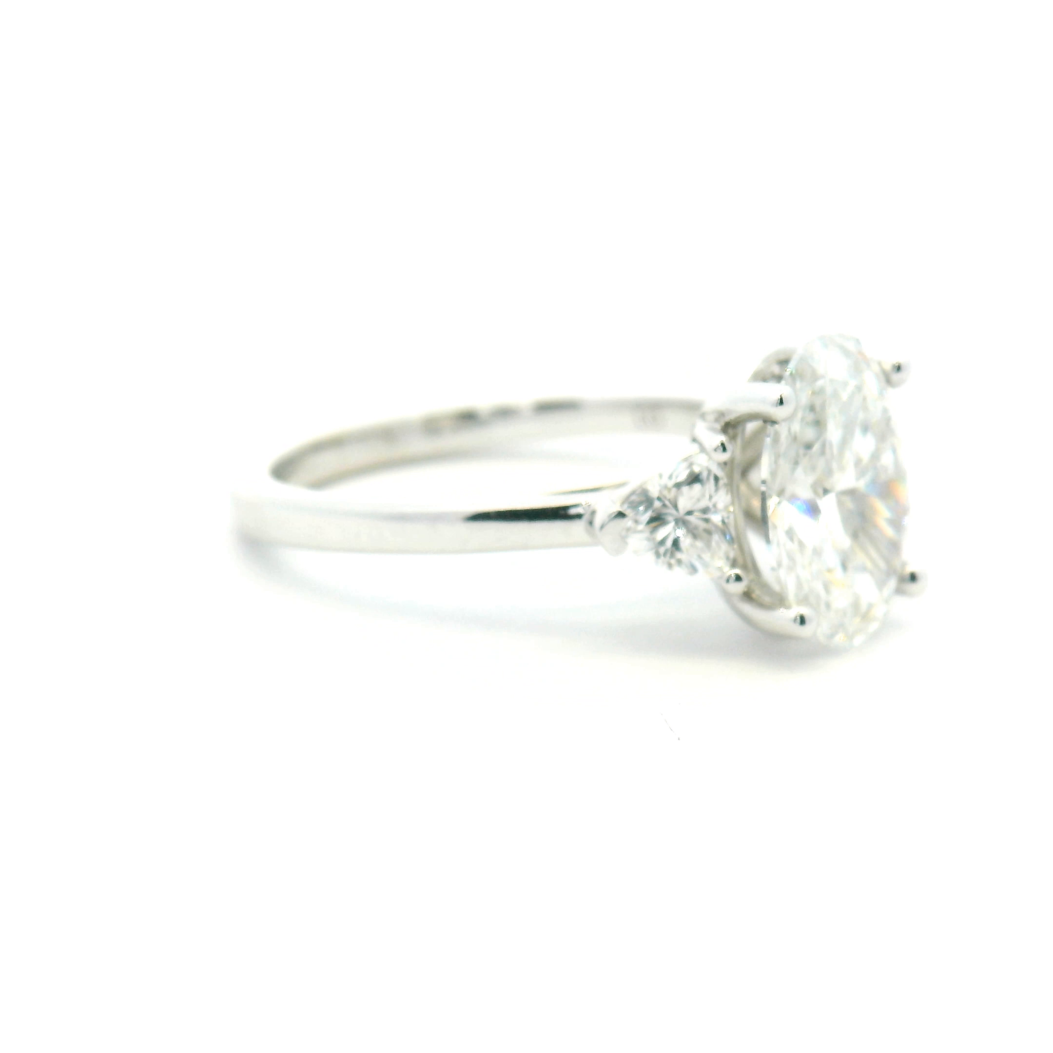 Oval Three Stone Diamond Engagement Ring