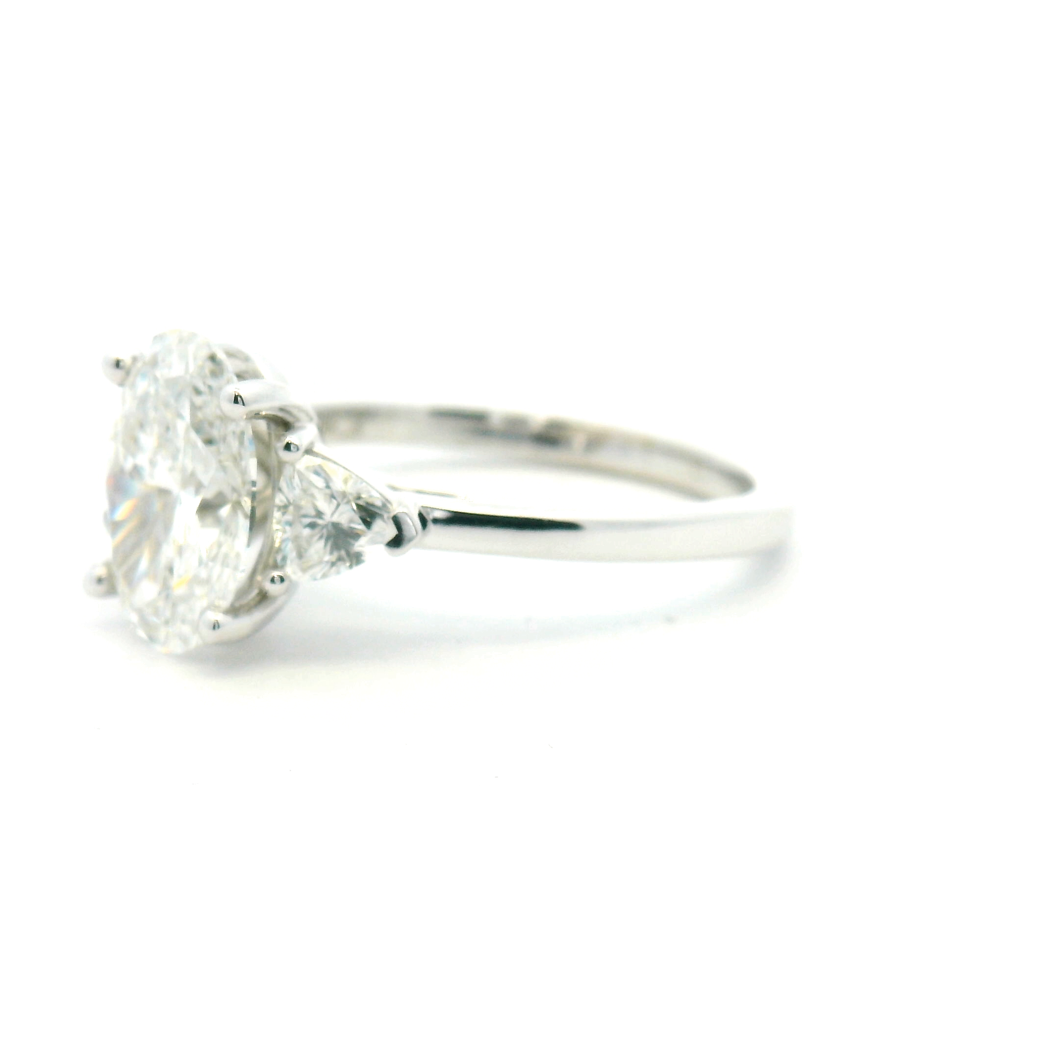 Oval Three Stone Diamond Engagement Ring