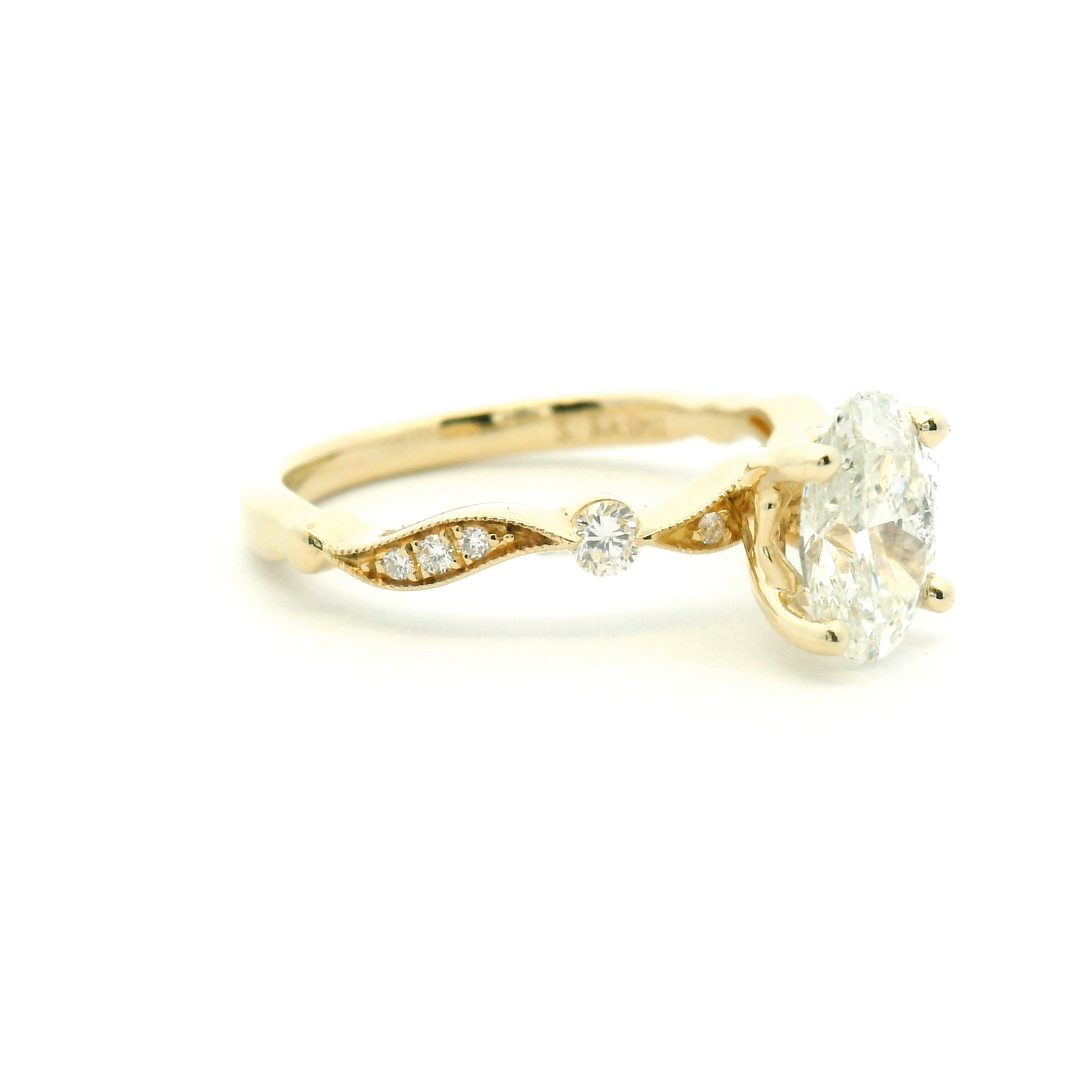 Oval Diamond Engagement Ring with Accented Twist Band