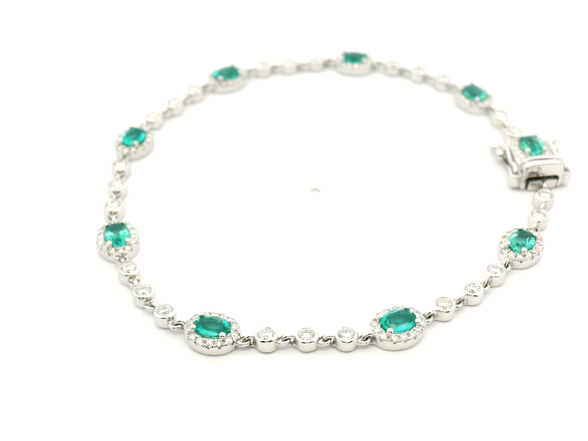 Oval Emerald Halo Bezel Bracelet