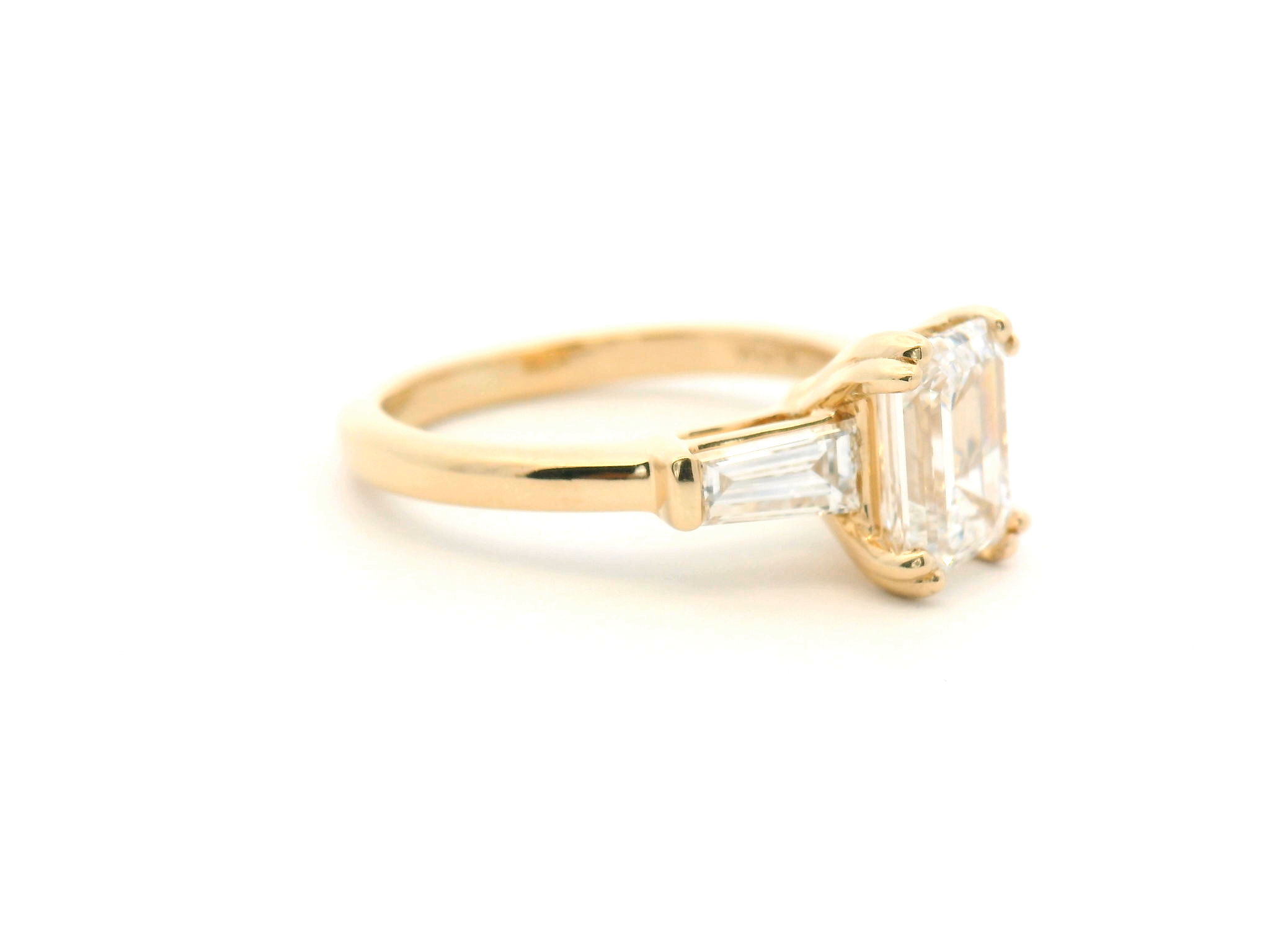 Emerald Cut Diamond Three Stone Engagement Ring