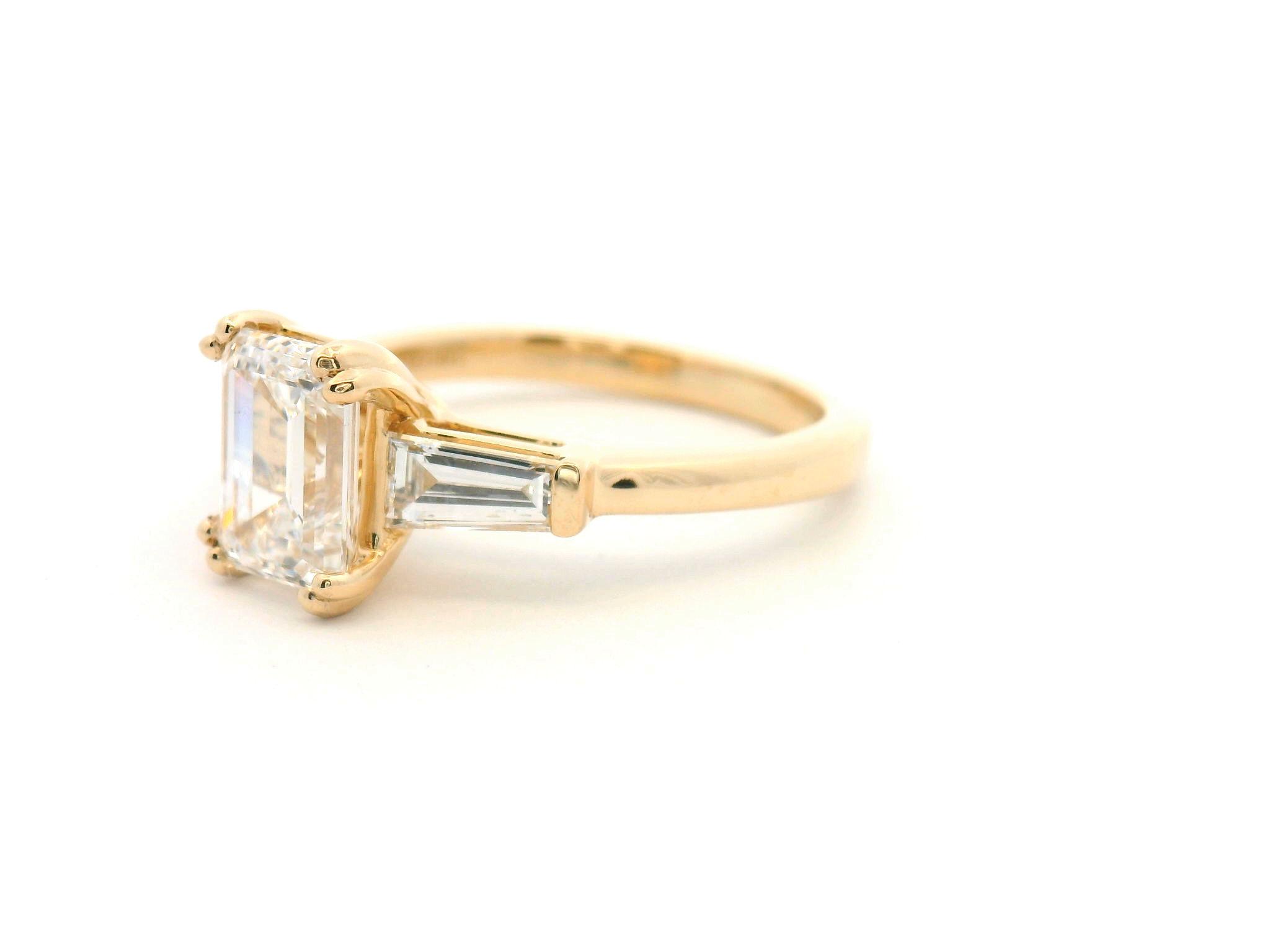 Emerald Cut Diamond Three Stone Engagement Ring