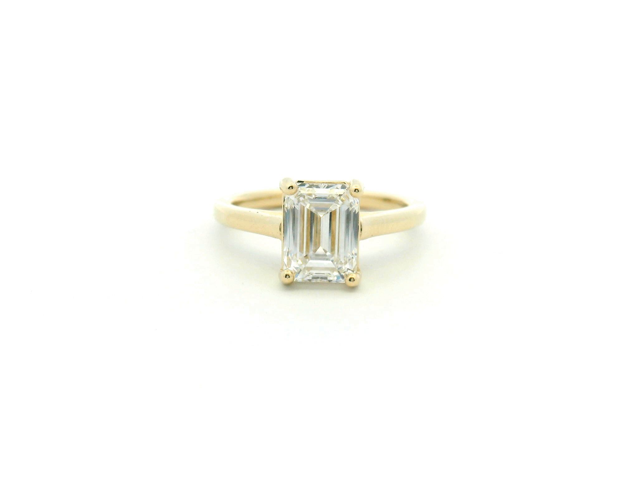 Emerald Cut Cathedral-Style Engagement Ring