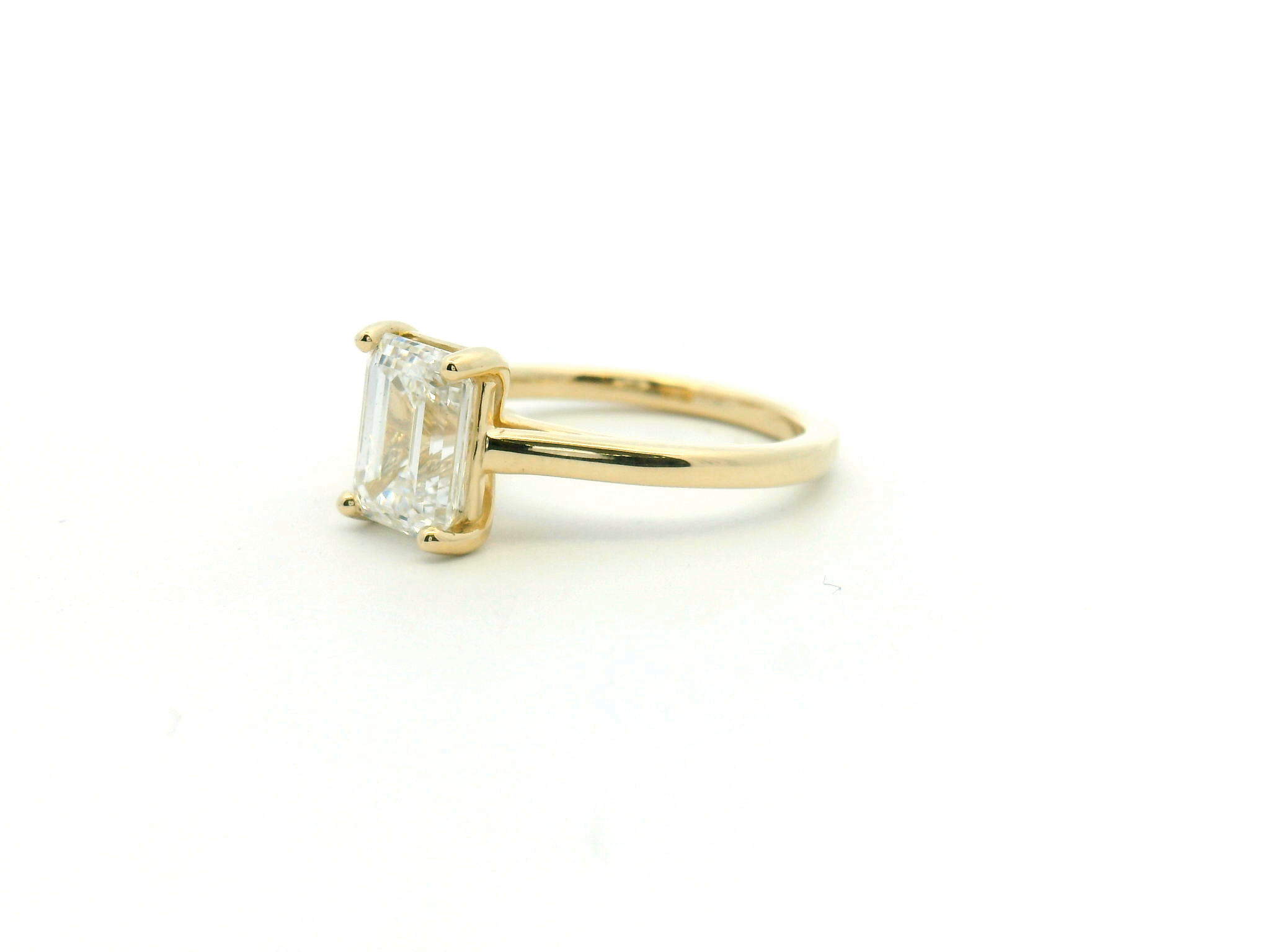 Emerald Cut Cathedral-Style Engagement Ring