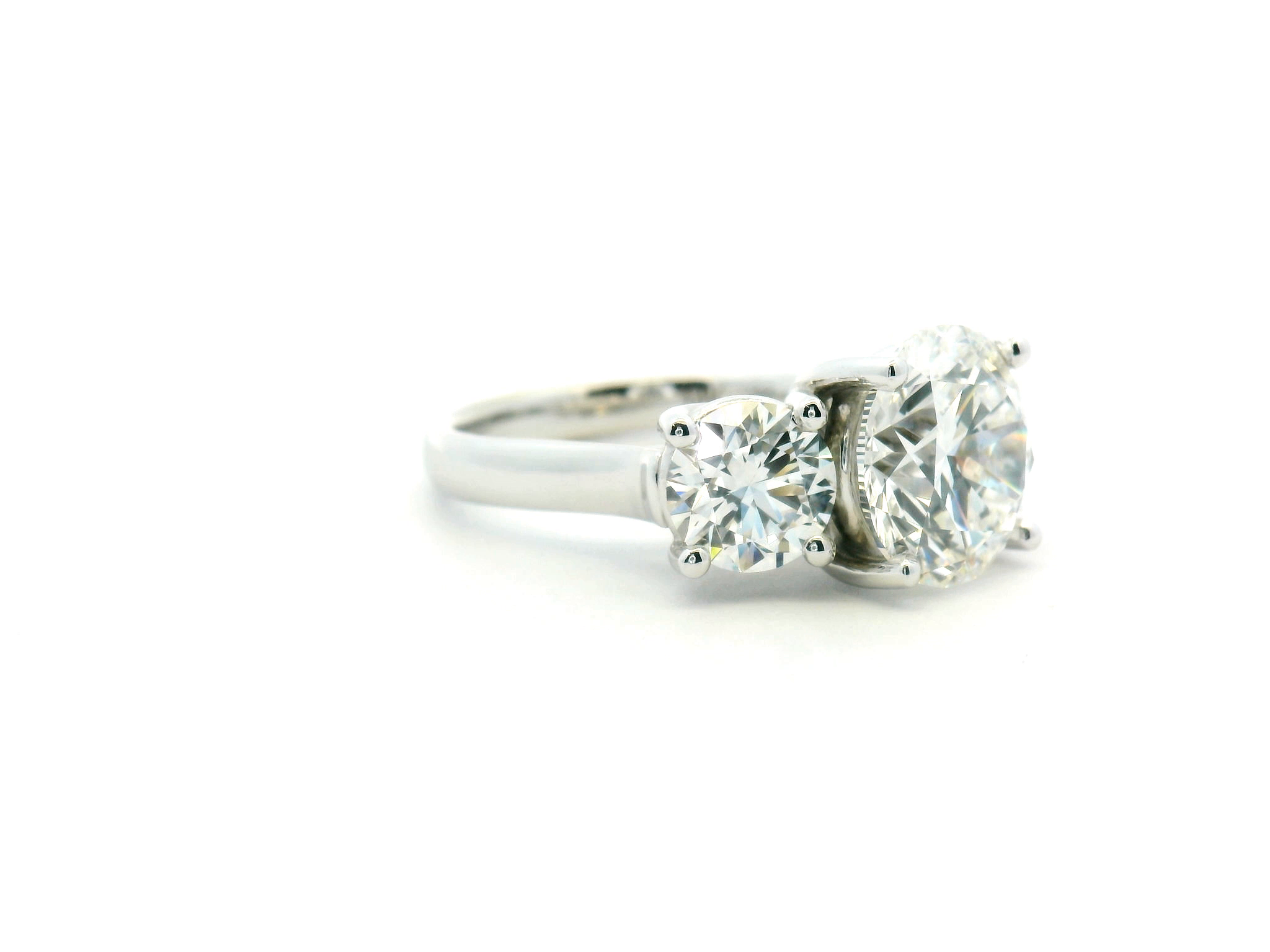 Round Three Stone Diamond Engagement Ring