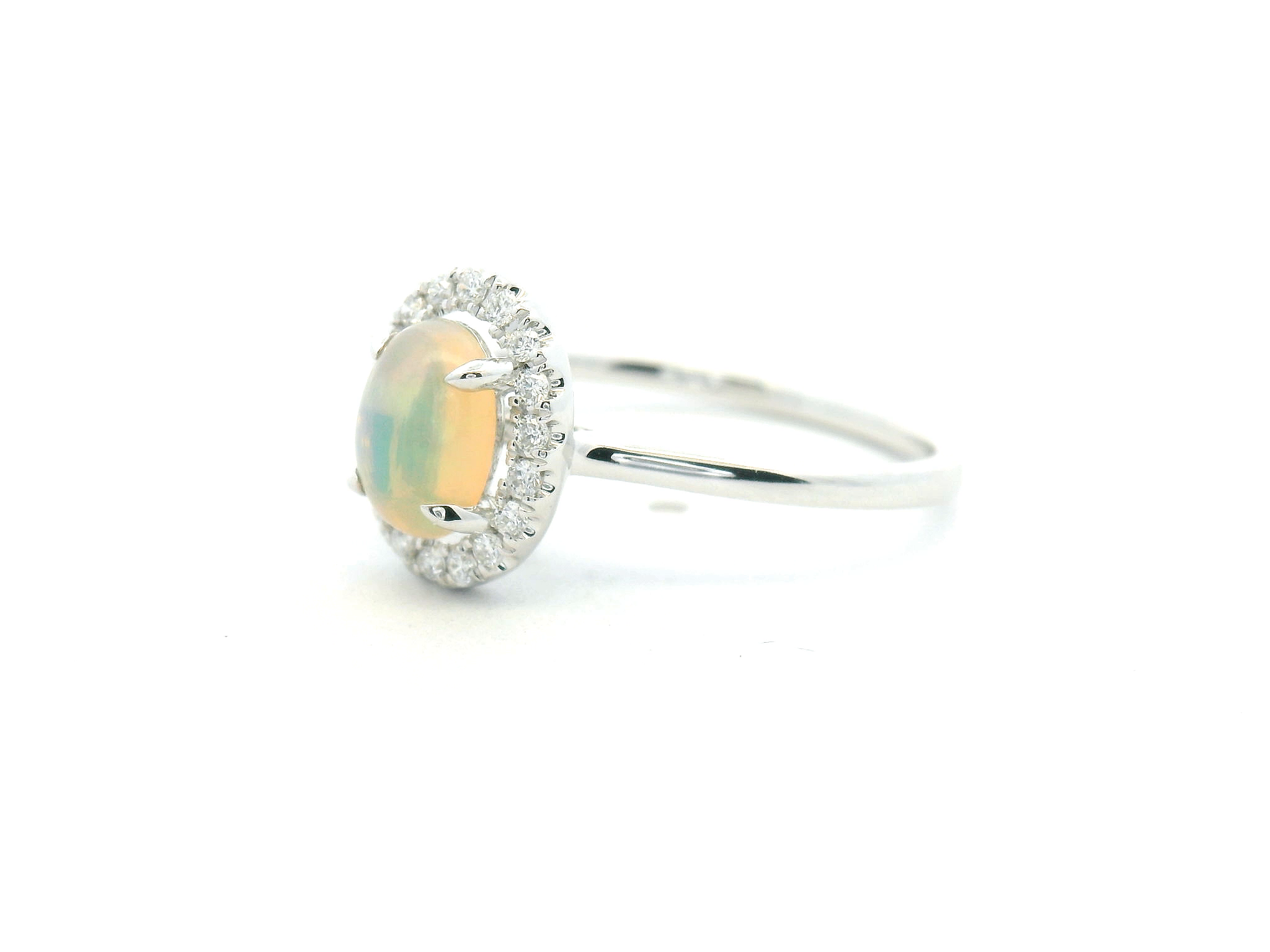 Opal and Diamond Halo Ring
