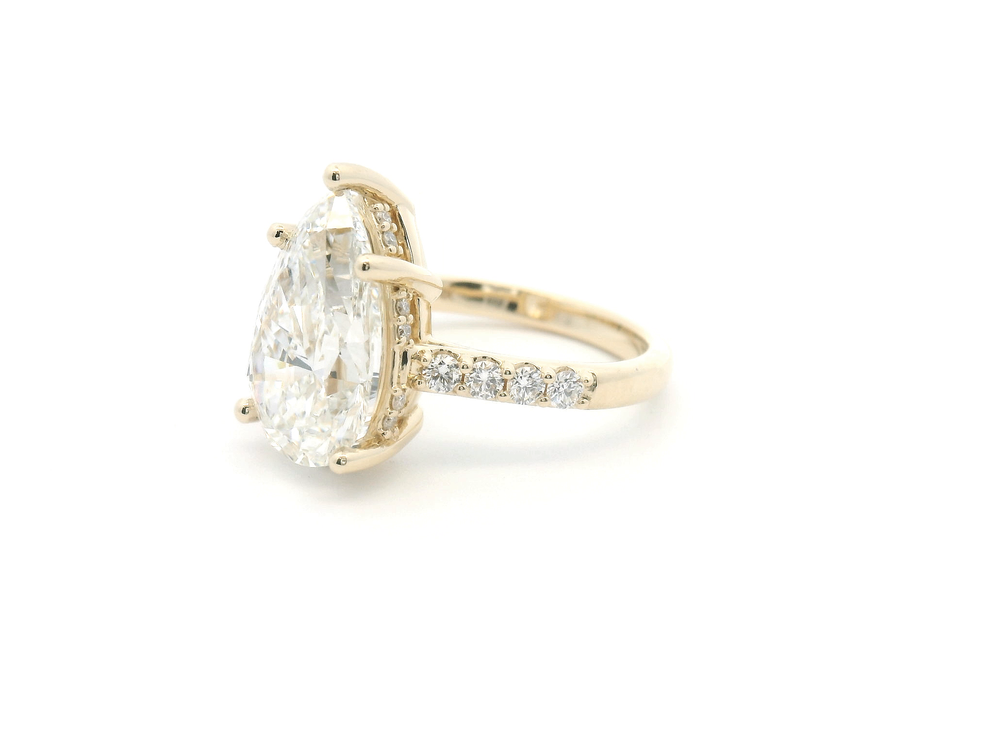 Pear Diamond Hidden Halo Engagement Ring with Accented Shank