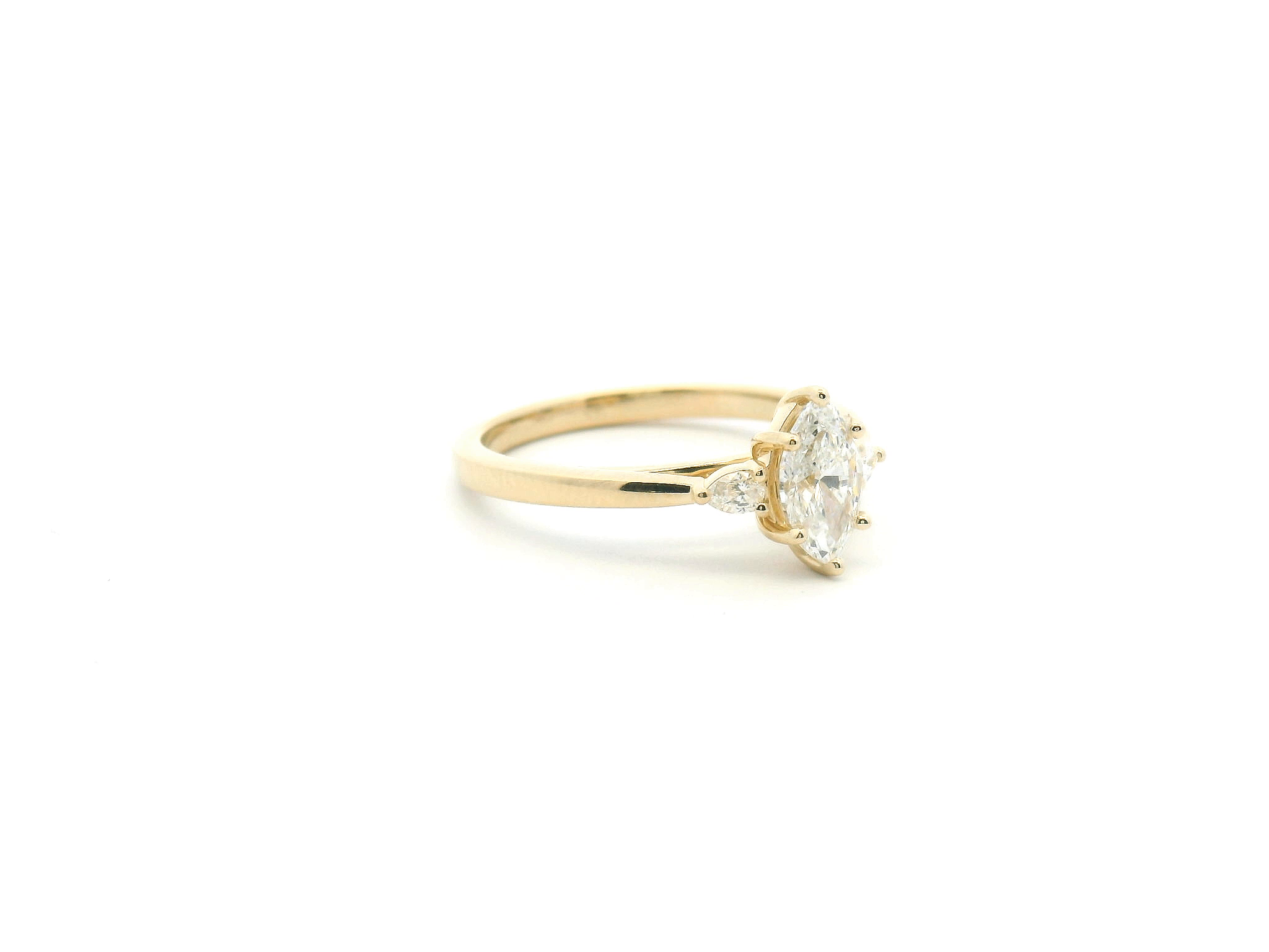 Marquise Diamond Three Stone Engagement Ring with Pear Side Stones