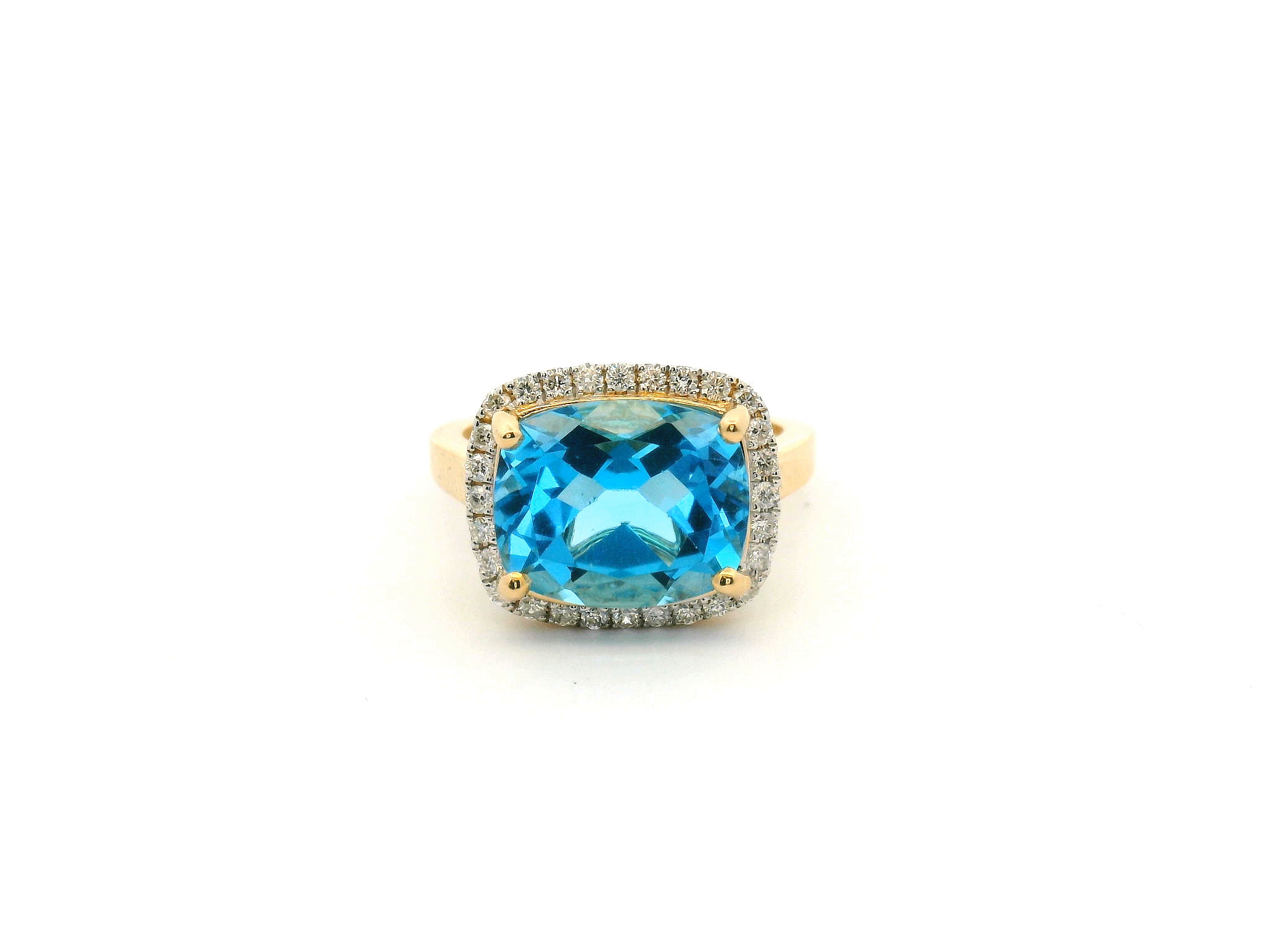 Blue Topaz and Diamond Halo Ring