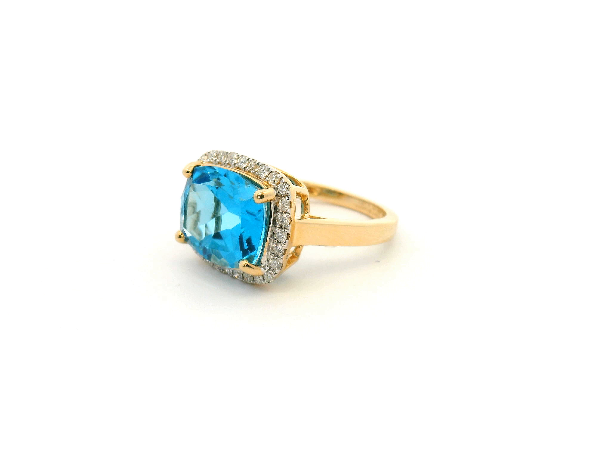 Blue Topaz and Diamond Halo Ring