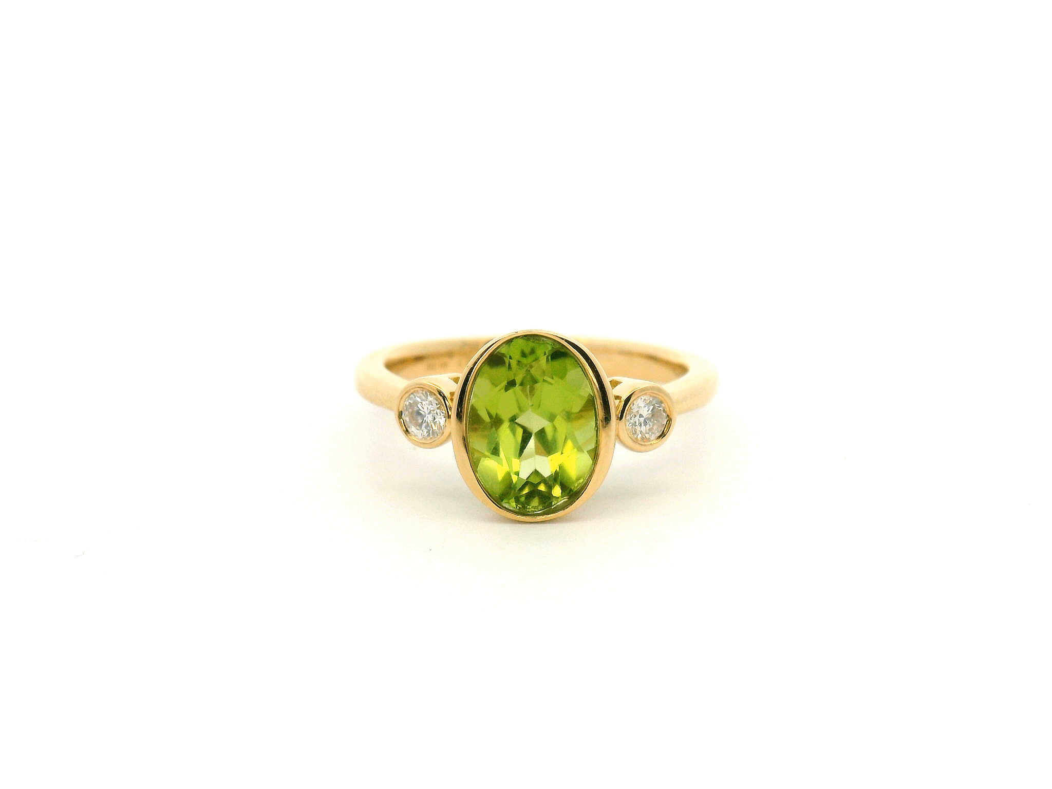 Peridot Bezel Set Three Stone Ring