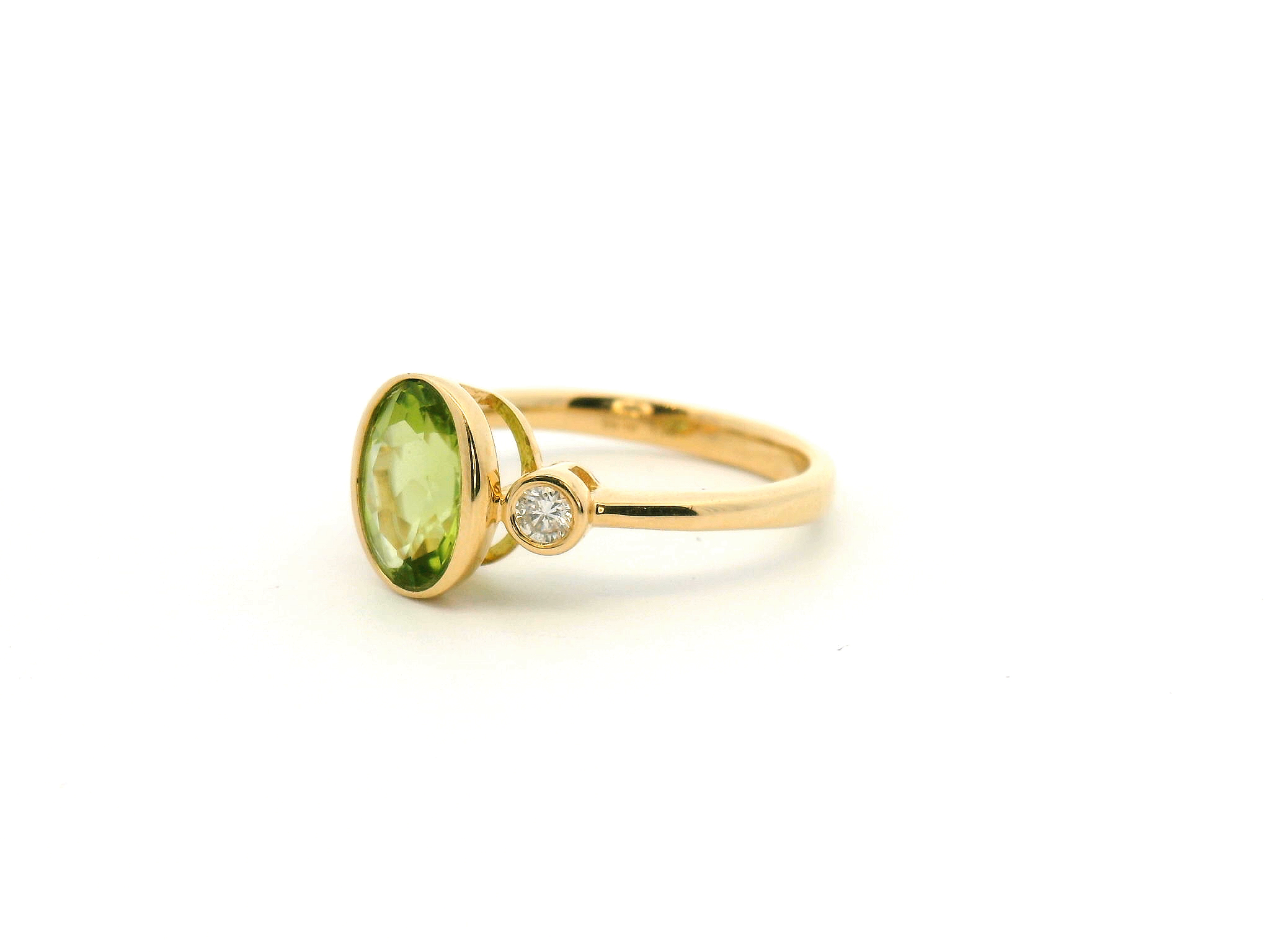Peridot Bezel Set Three Stone Ring