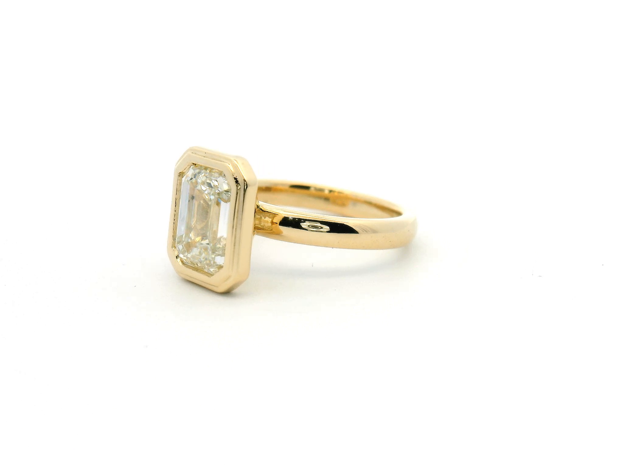Emerald Cut Diamond Bezel Set Engagement Ring