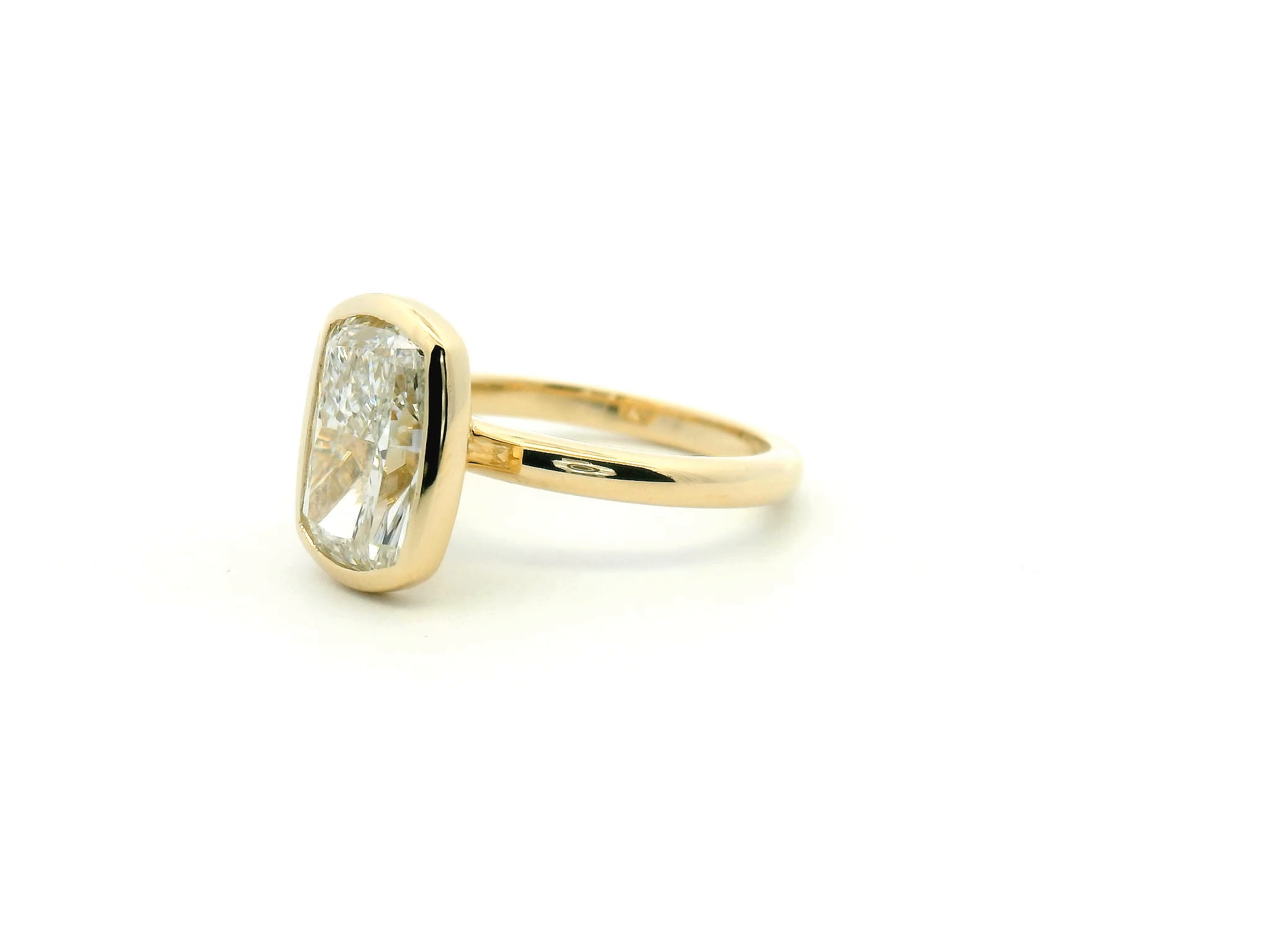Elongated Cushion Cut Bezel Set Engagement Ring