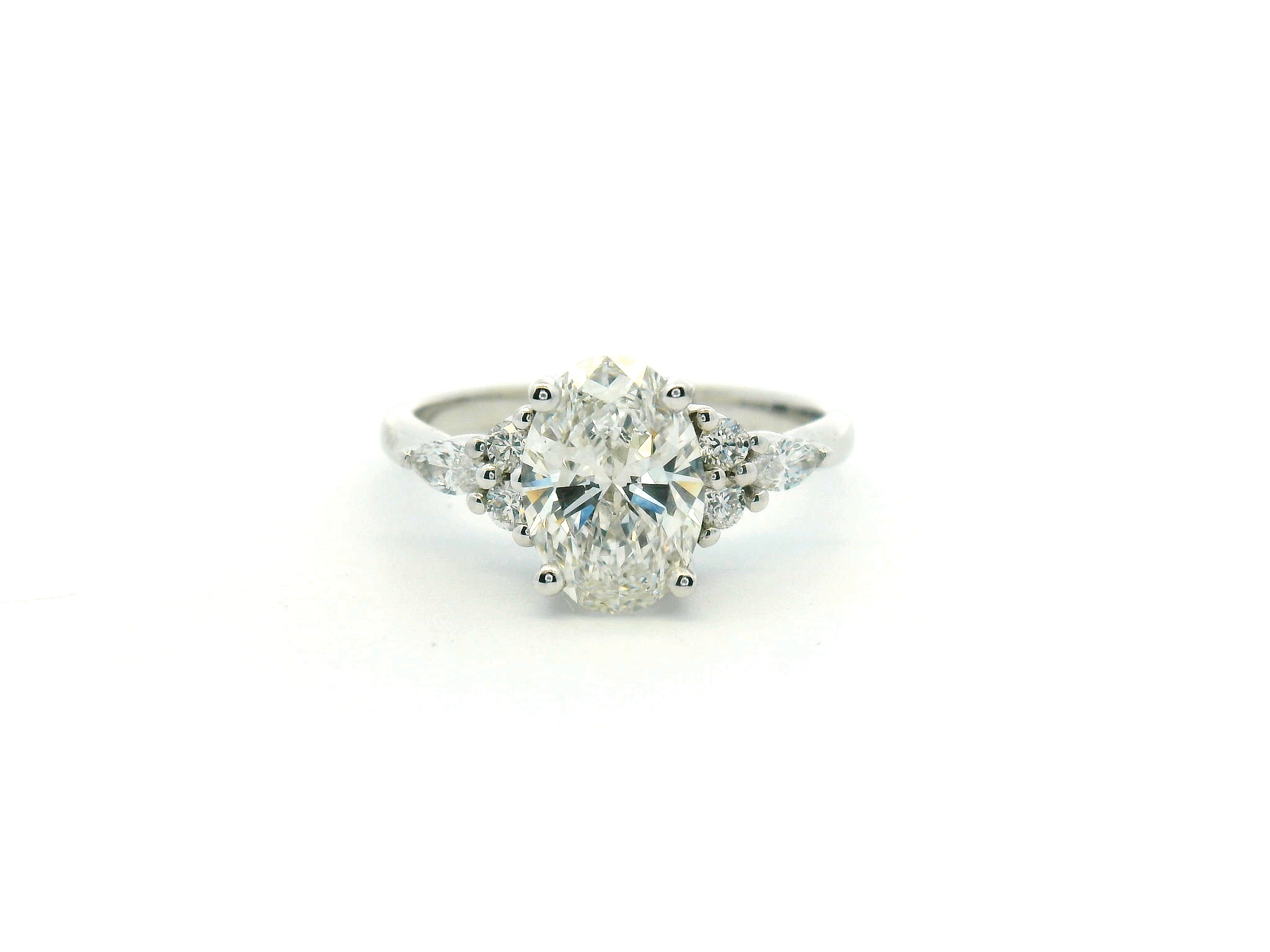 Oval Diamond Cluster Engagement Ring