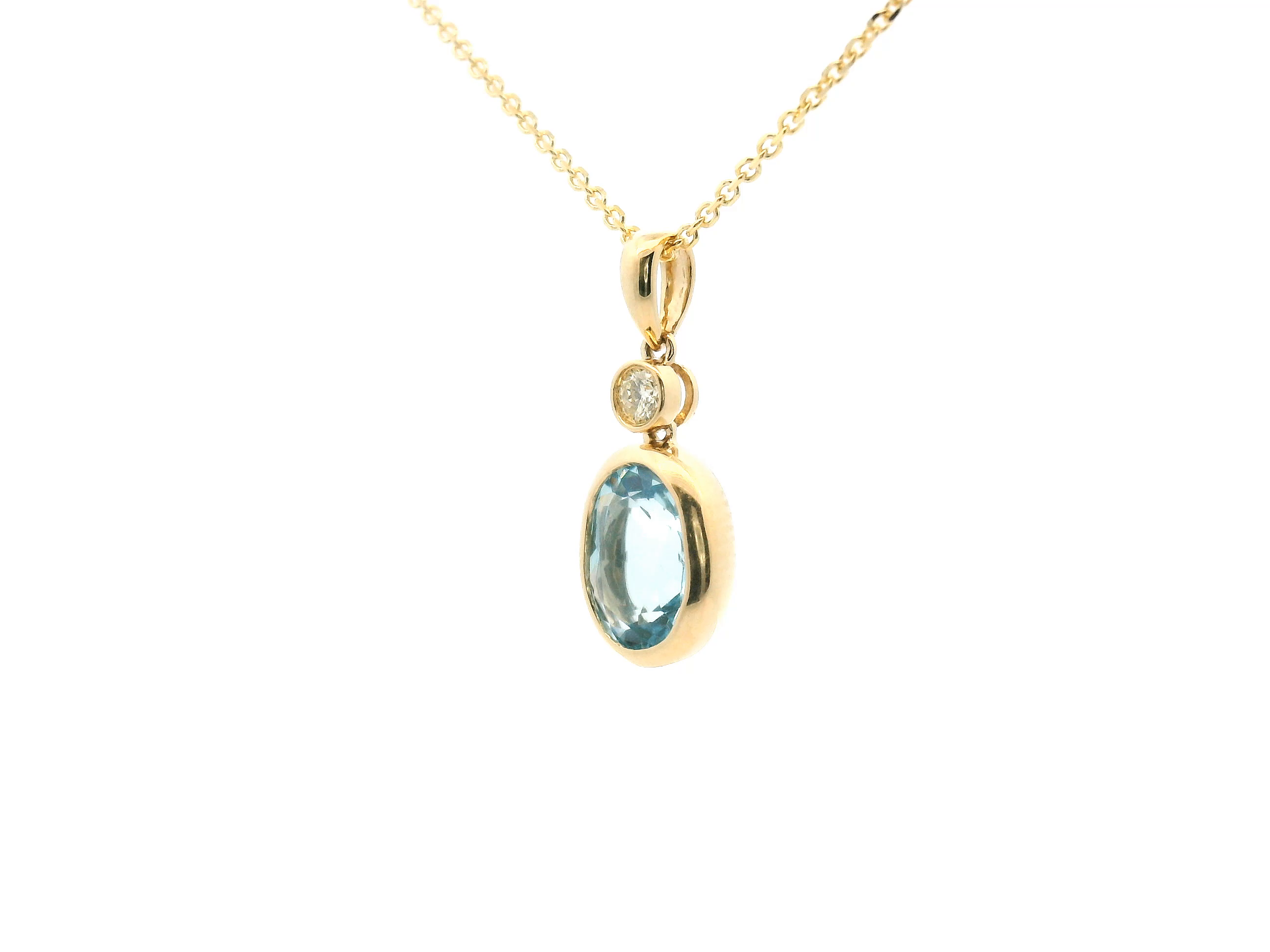Blue Topaz and Diamond Bezel Pendant Necklace