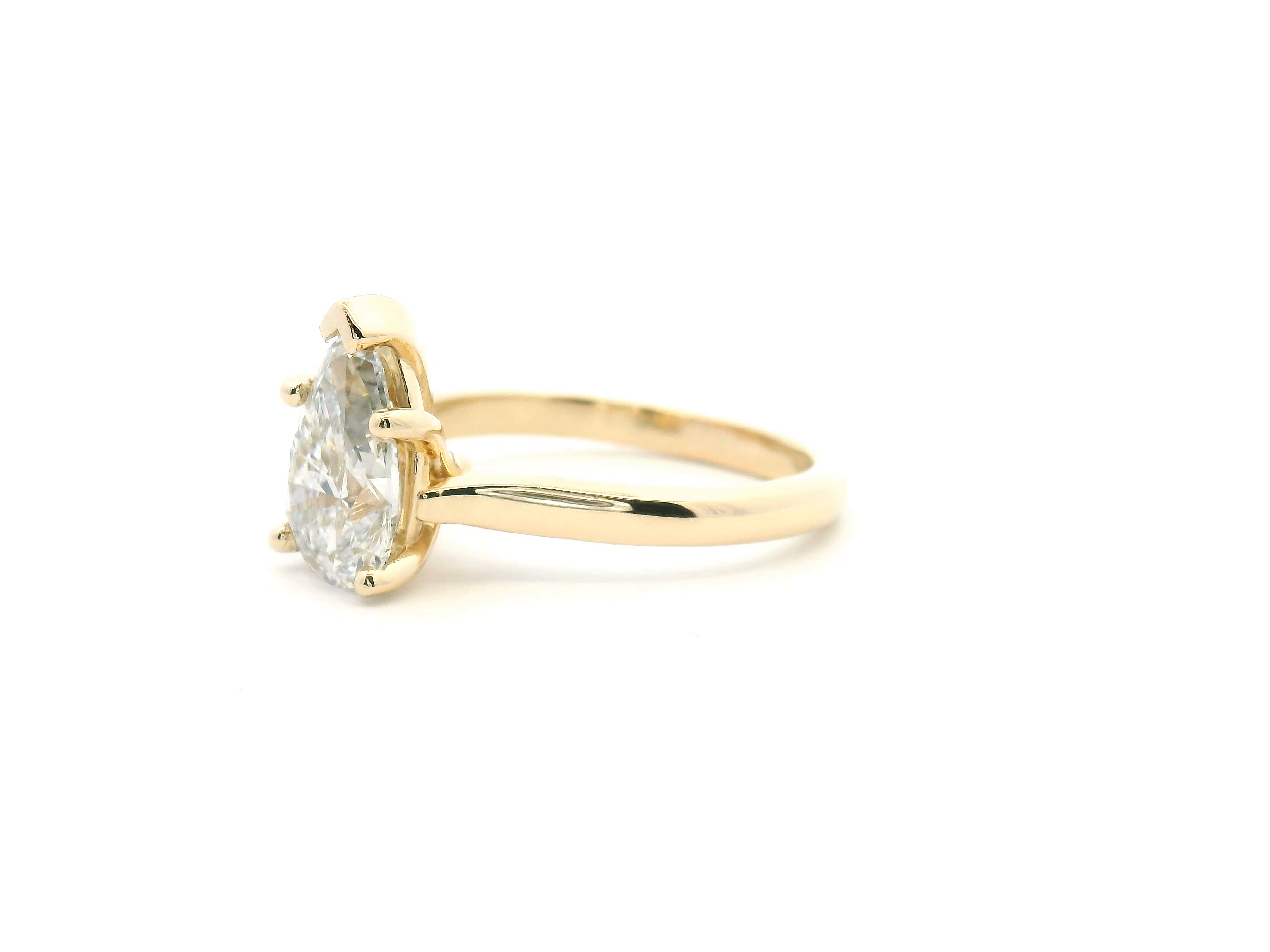 Pear Solitaire Cathedral Engagement Ring