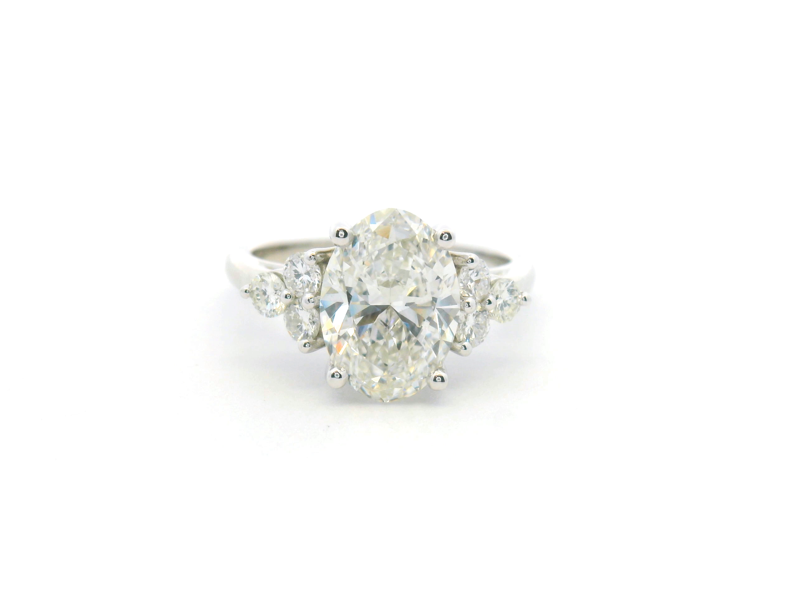 Oval Cluster Accent Engagement Ring